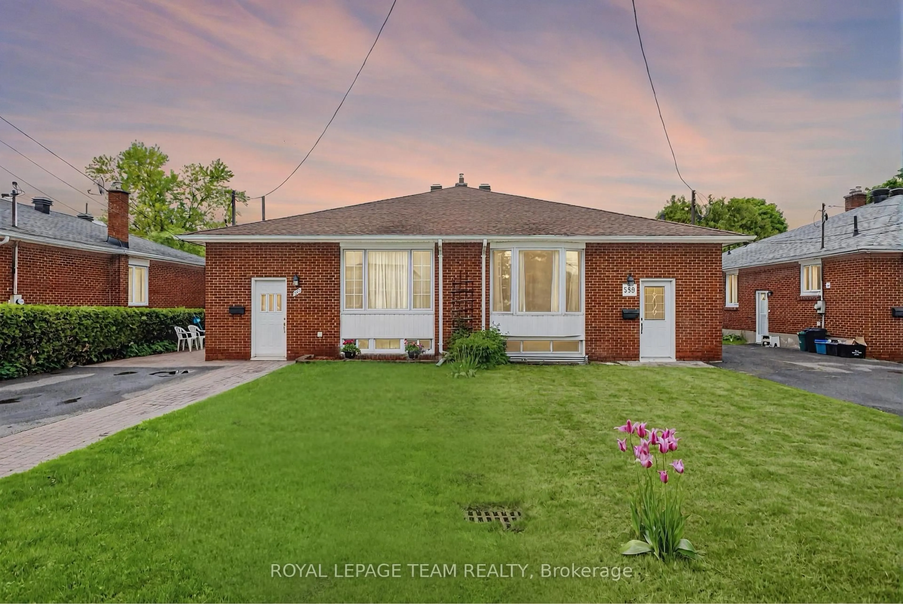 Home with brick exterior material, street for 599 Mutual St, Ottawa Ontario K1K 1C3