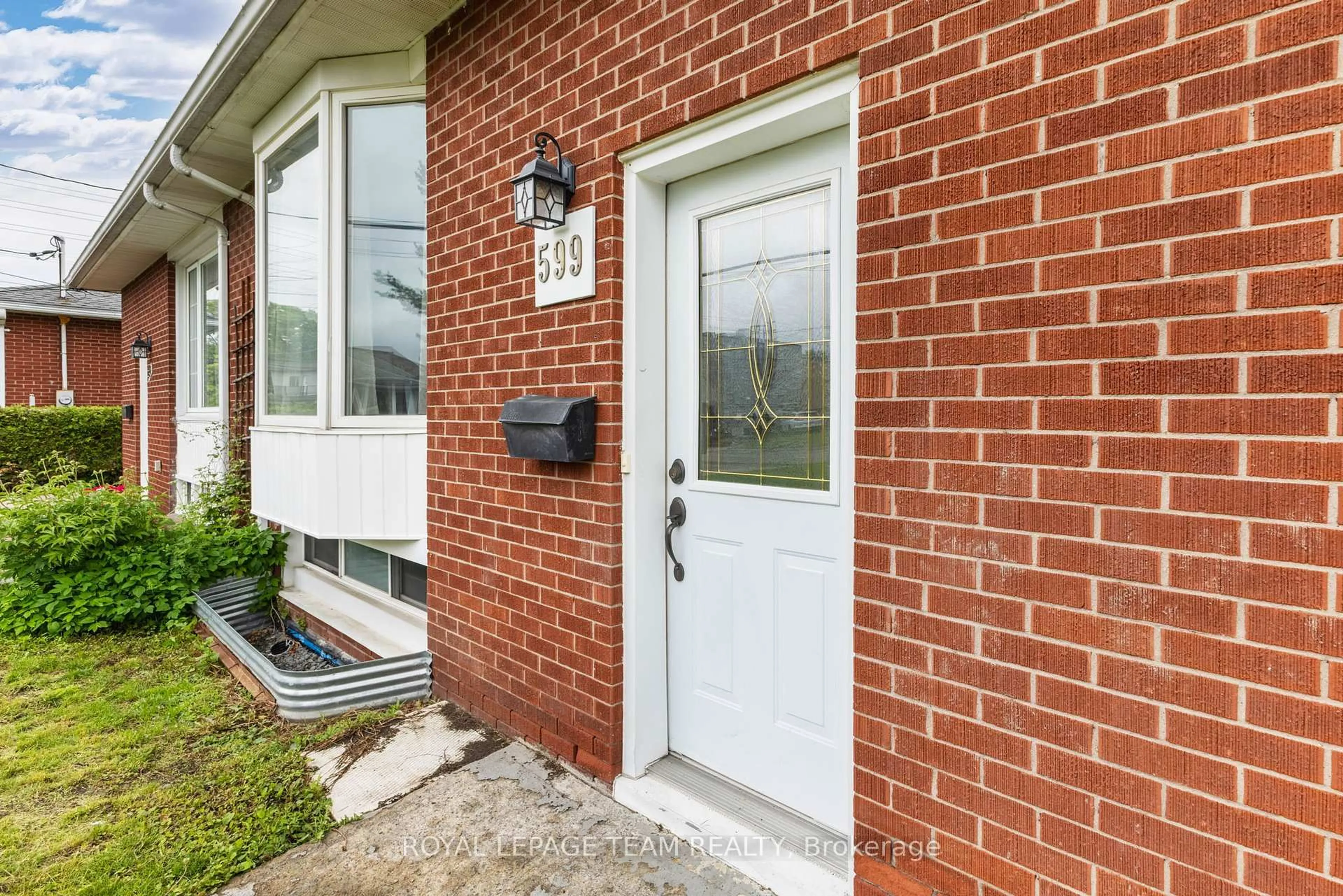 Home with brick exterior material, street for 599 Mutual St, Ottawa Ontario K1K 1C3