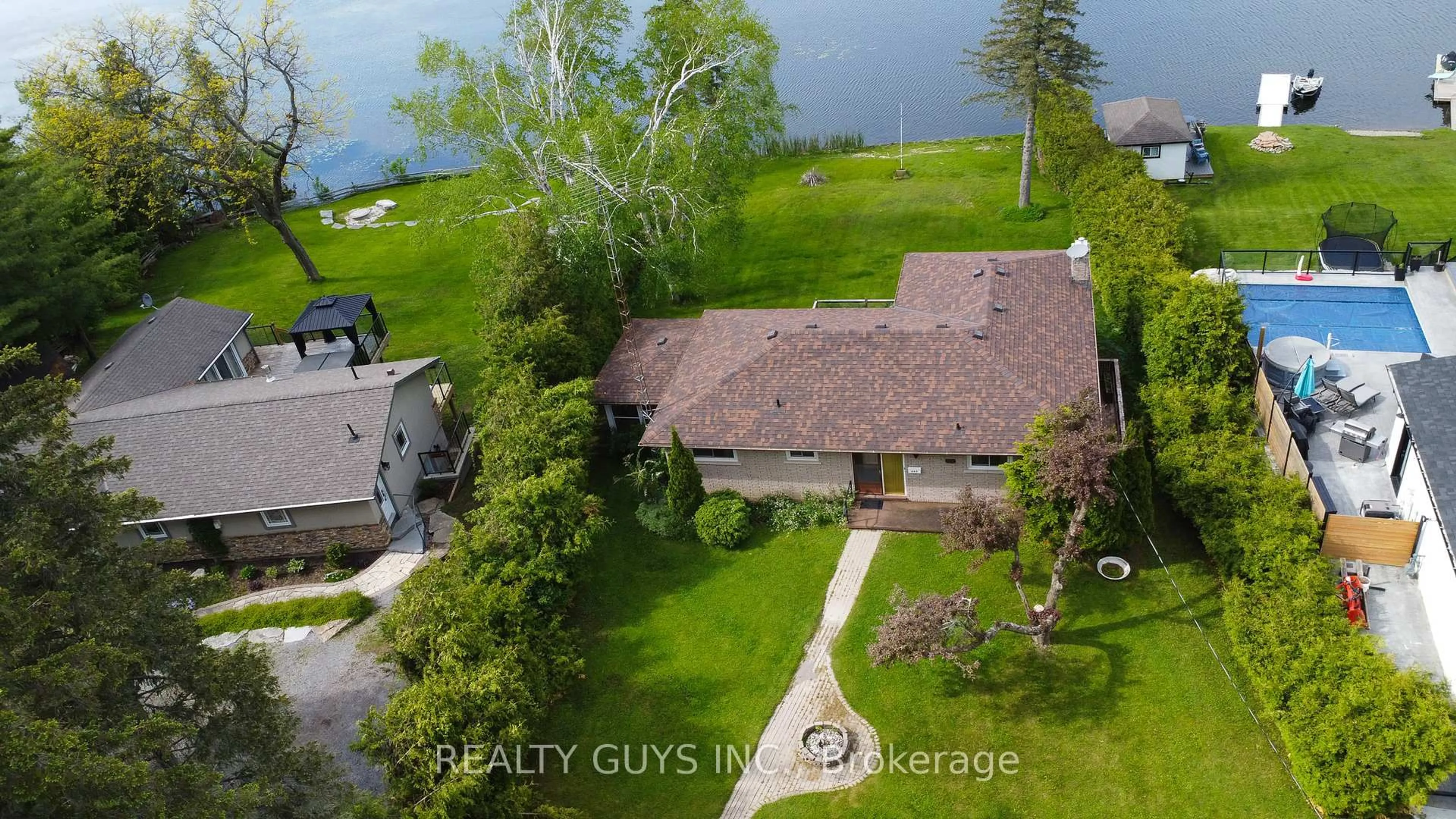 A pic from outside/outdoor area/front of a property/back of a property/a pic from drone, water/lake/river/ocean view for 665 Fire 1 Rte, Selwyn Ontario K9J 6X3
