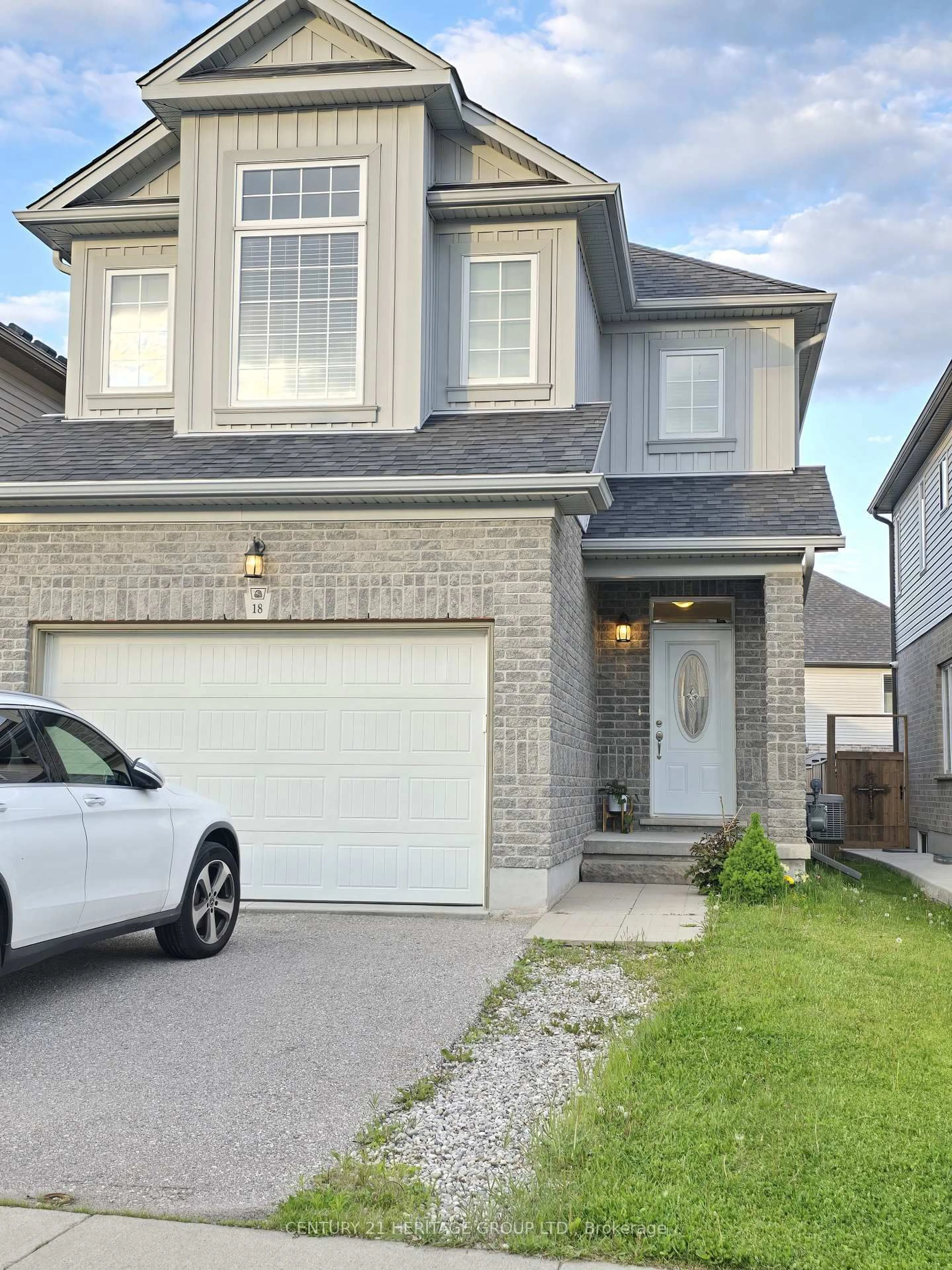 Home with brick exterior material, street for 18 Spring Creek St, Kitchener Ontario N2A 0G3