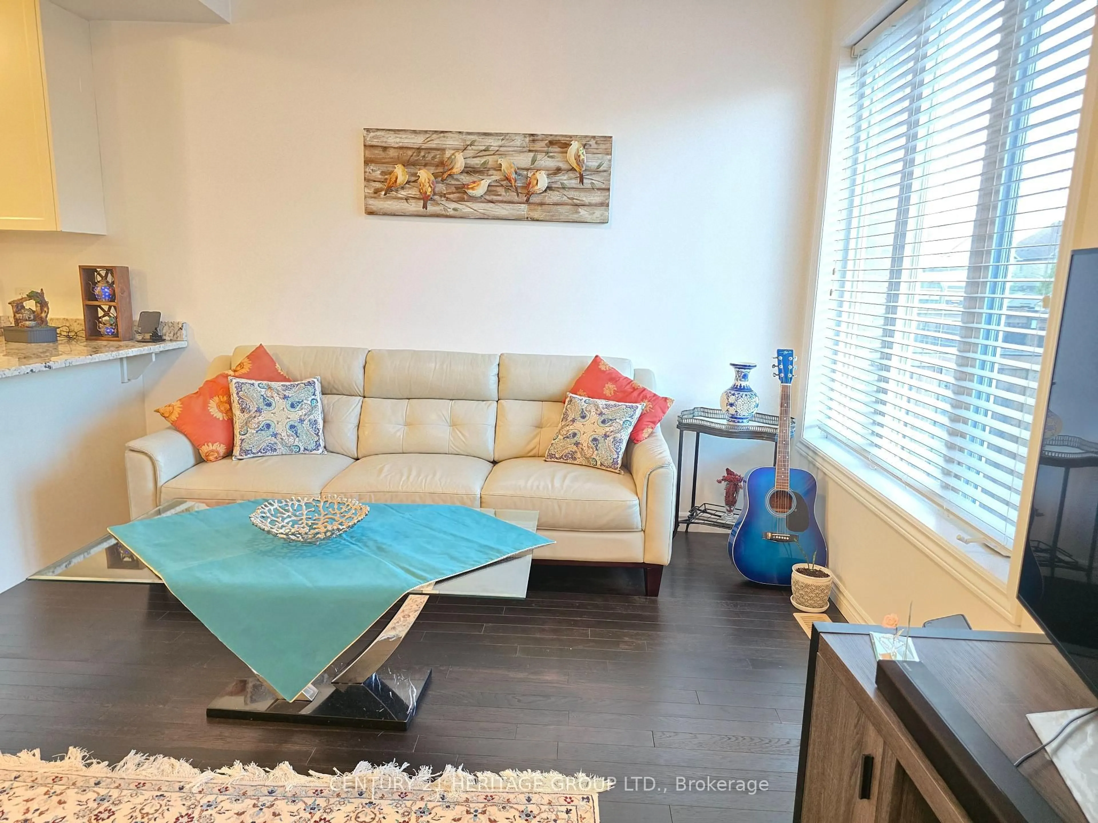Living room with furniture, wood/laminate floor for 18 Spring Creek St, Kitchener Ontario N2A 0G3