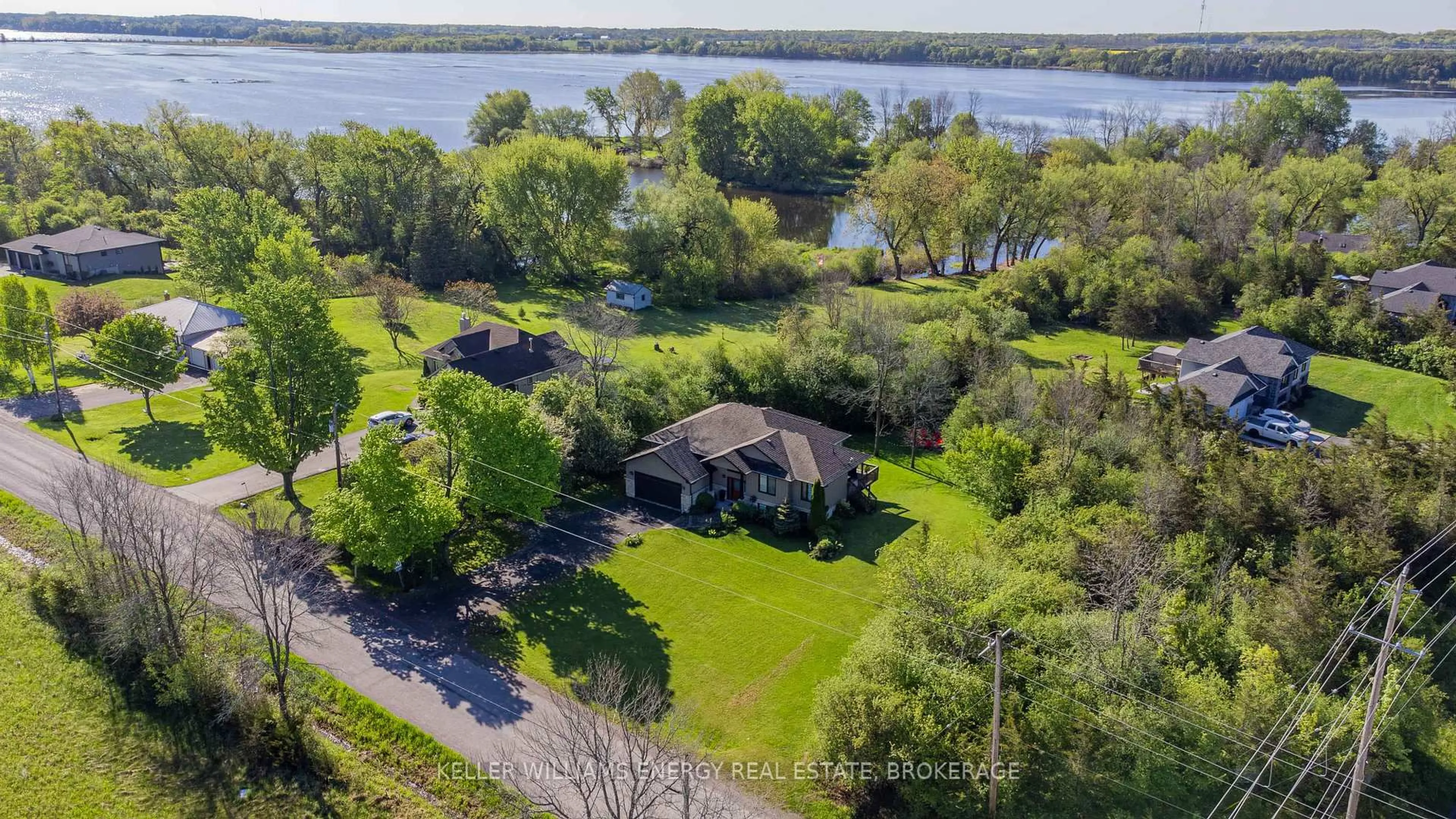 A pic from outside/outdoor area/front of a property/back of a property/a pic from drone, water/lake/river/ocean view for 1687 Lakeside Dr, Prince Edward County Ontario K0K 1T0