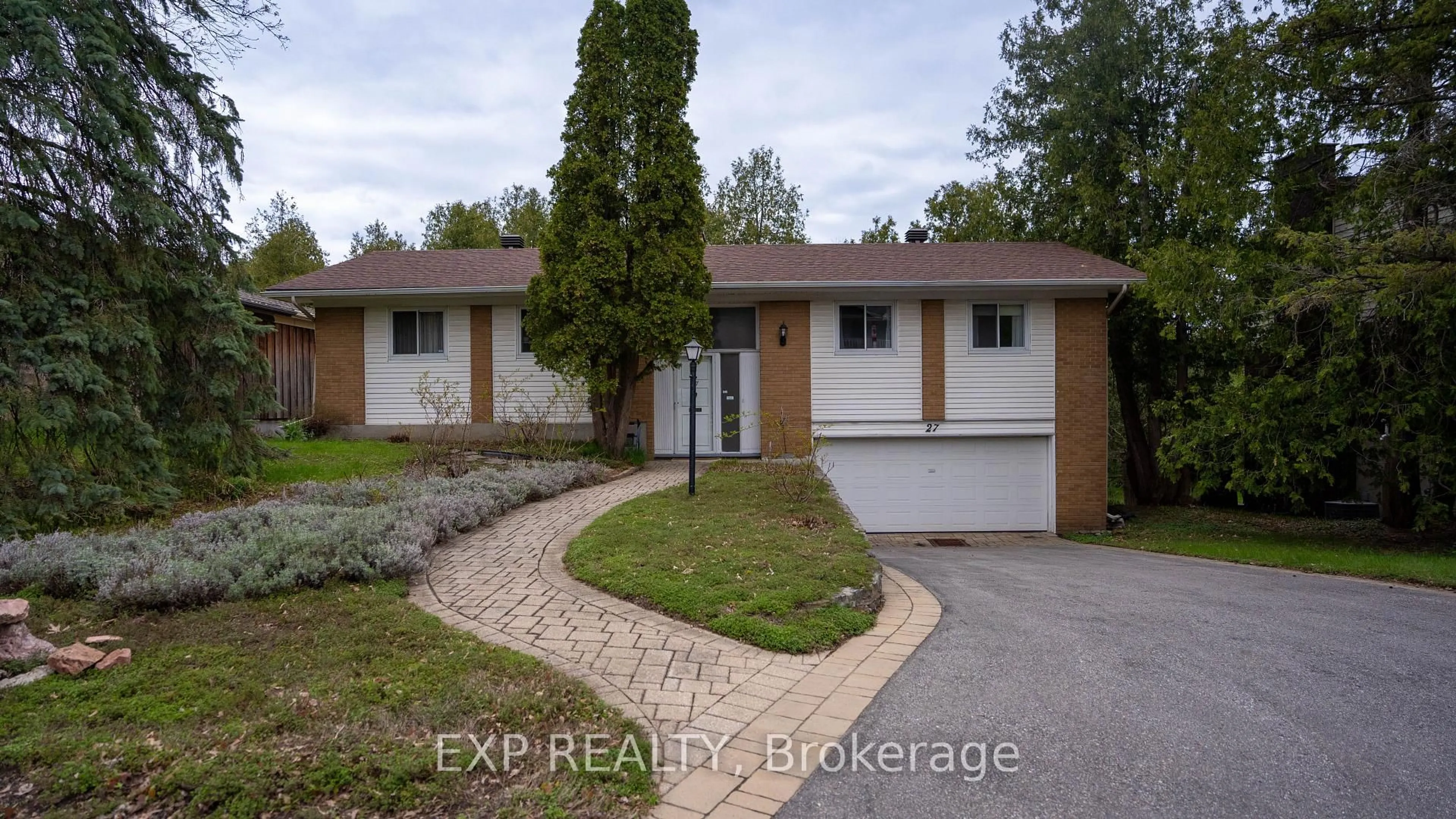 Home with brick exterior material, street for 27 Commanche Dr, Ottawa Ontario K2E 6E8