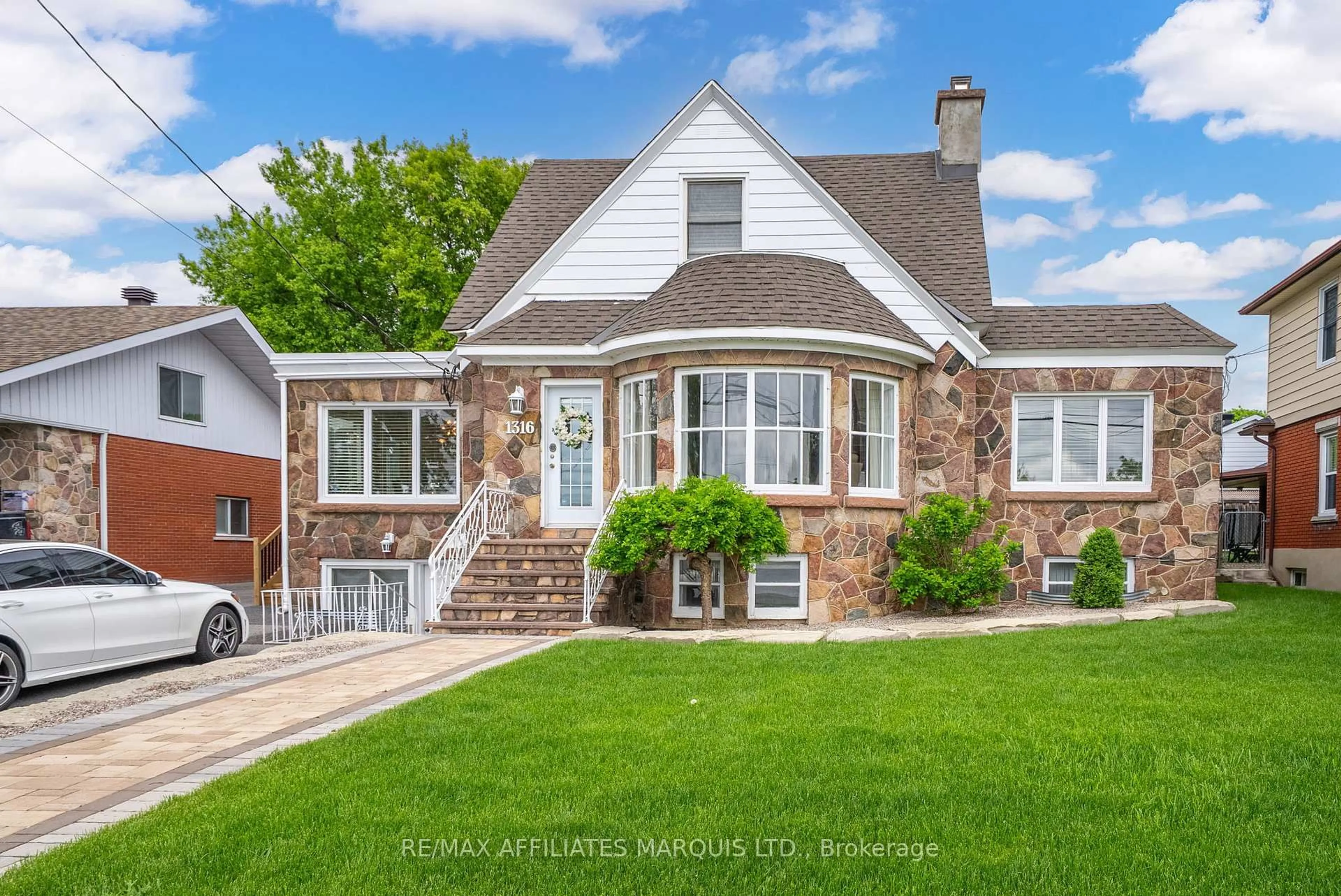 Home with brick exterior material, street for 1316 Montreal Rd, Cornwall Ontario K6H 1E6