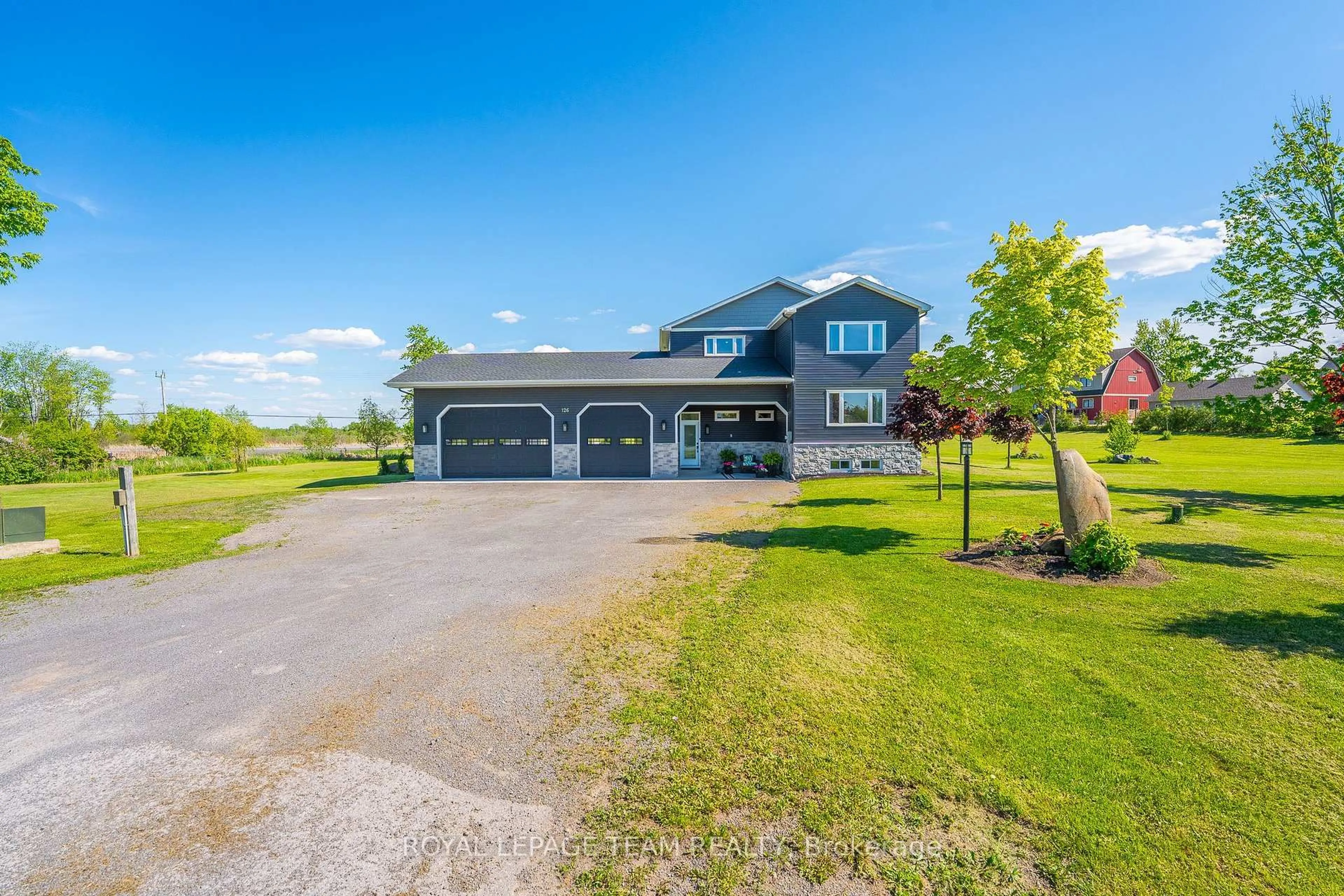A pic from outside/outdoor area/front of a property/back of a property/a pic from drone, water/lake/river/ocean view for 126 Grasshopper Lane, Ottawa Ontario K0A 1T0