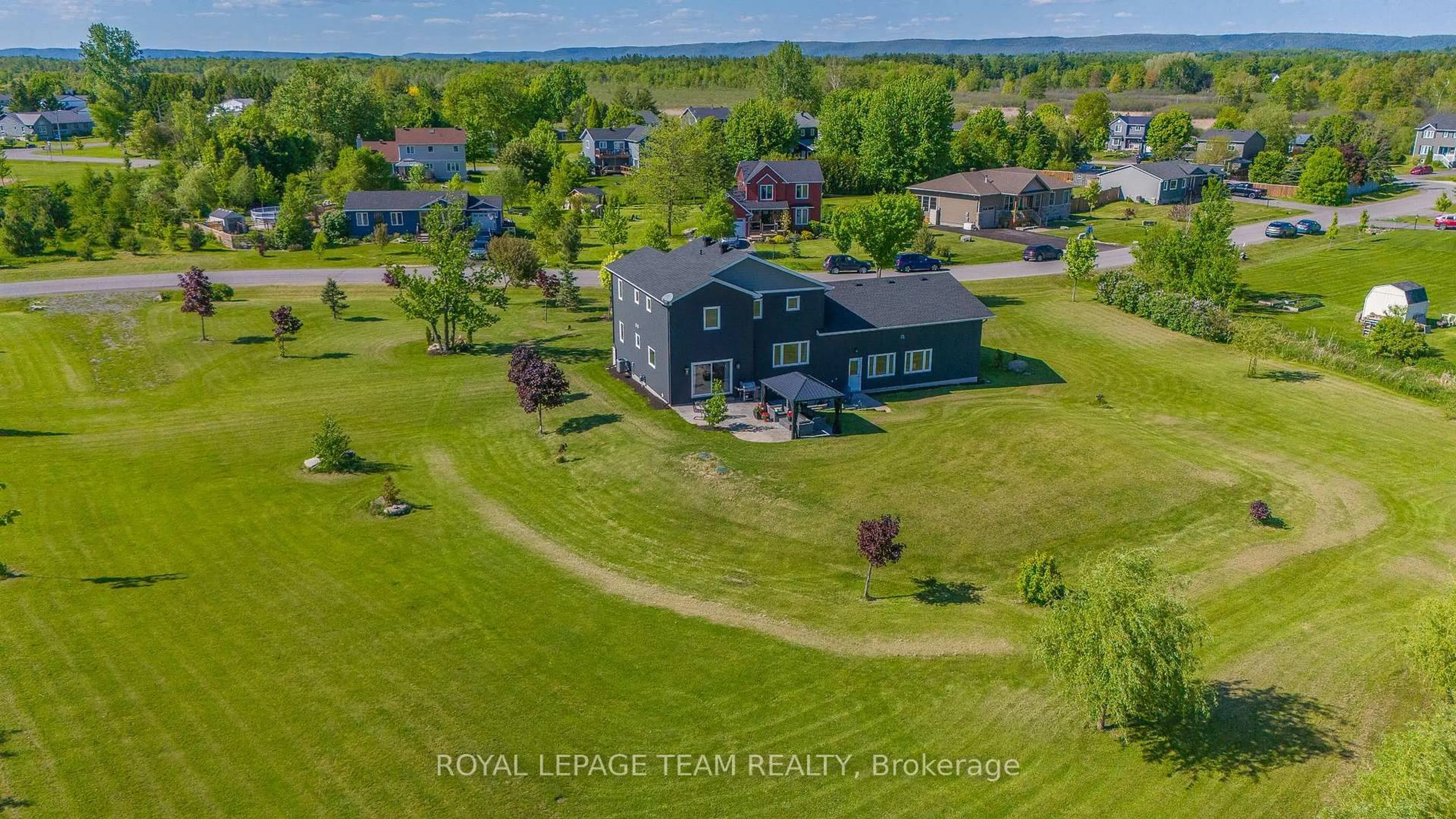 A pic from outside/outdoor area/front of a property/back of a property/a pic from drone, water/lake/river/ocean view for 126 Grasshopper Lane, Ottawa Ontario K0A 1T0
