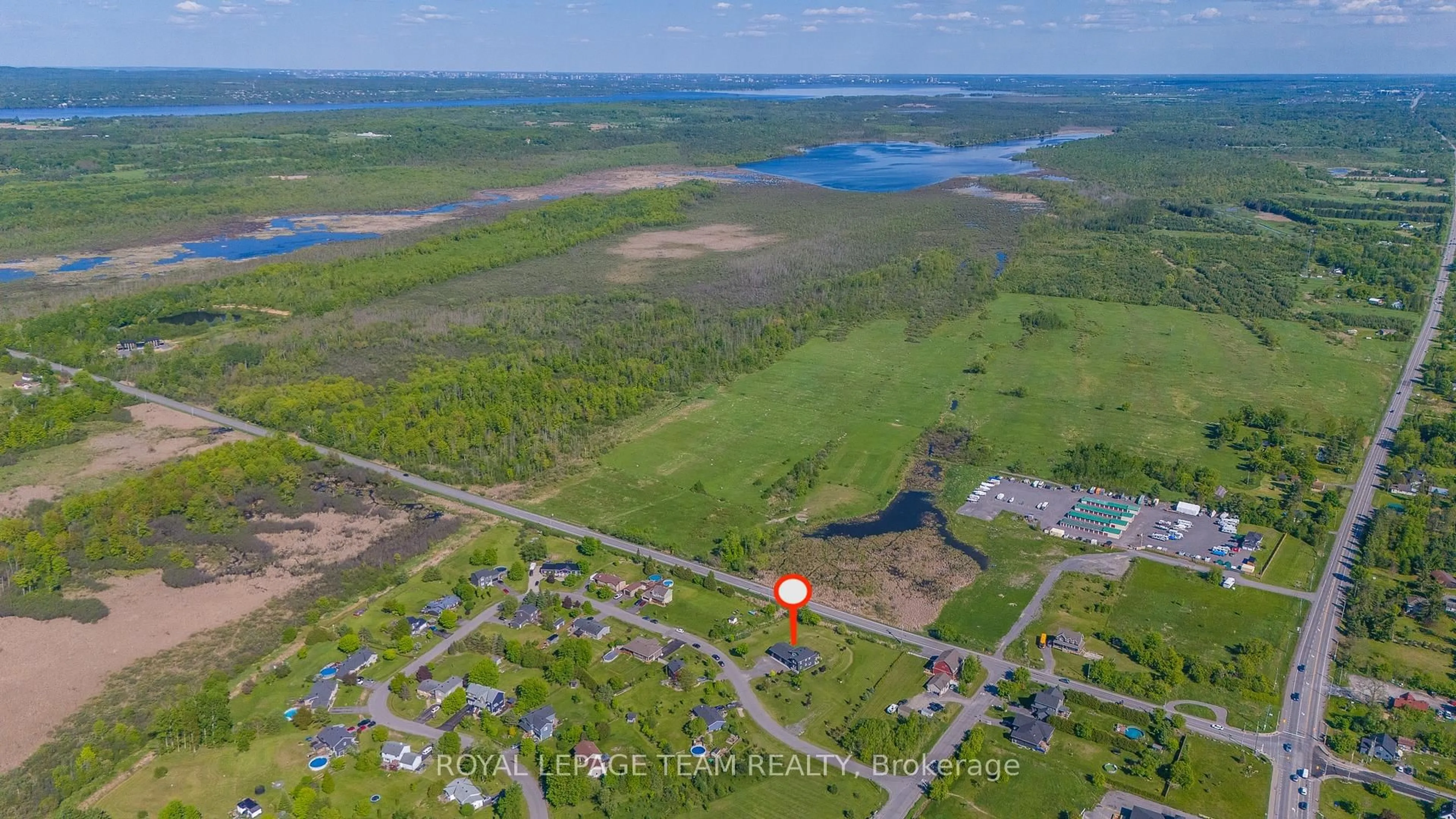 A pic from outside/outdoor area/front of a property/back of a property/a pic from drone, water/lake/river/ocean view for 126 Grasshopper Lane, Ottawa Ontario K0A 1T0