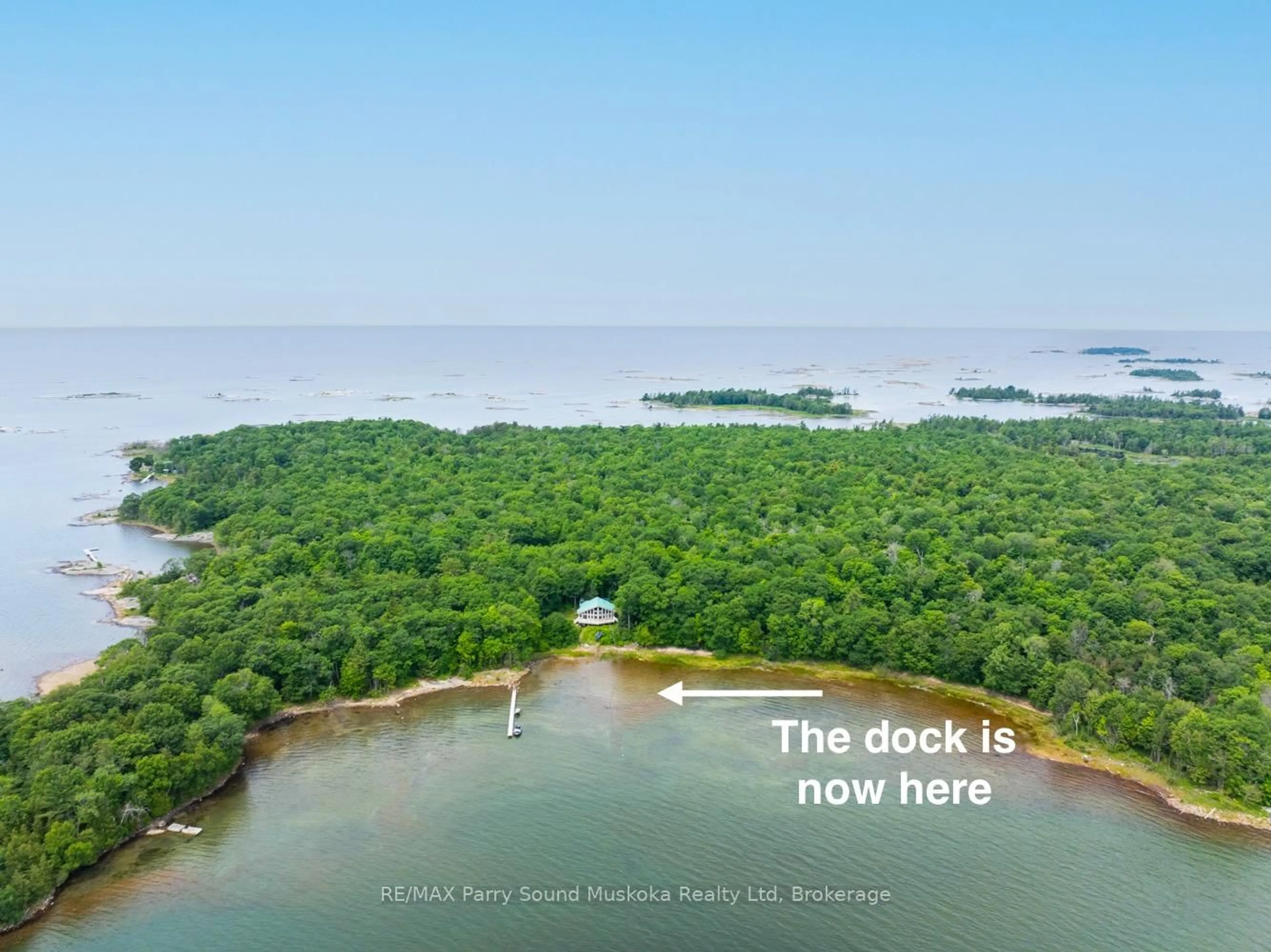 A pic from outside/outdoor area/front of a property/back of a property/a pic from drone, water/lake/river/ocean view for 53 Sandy Island, Carling Ontario P2A 0B7