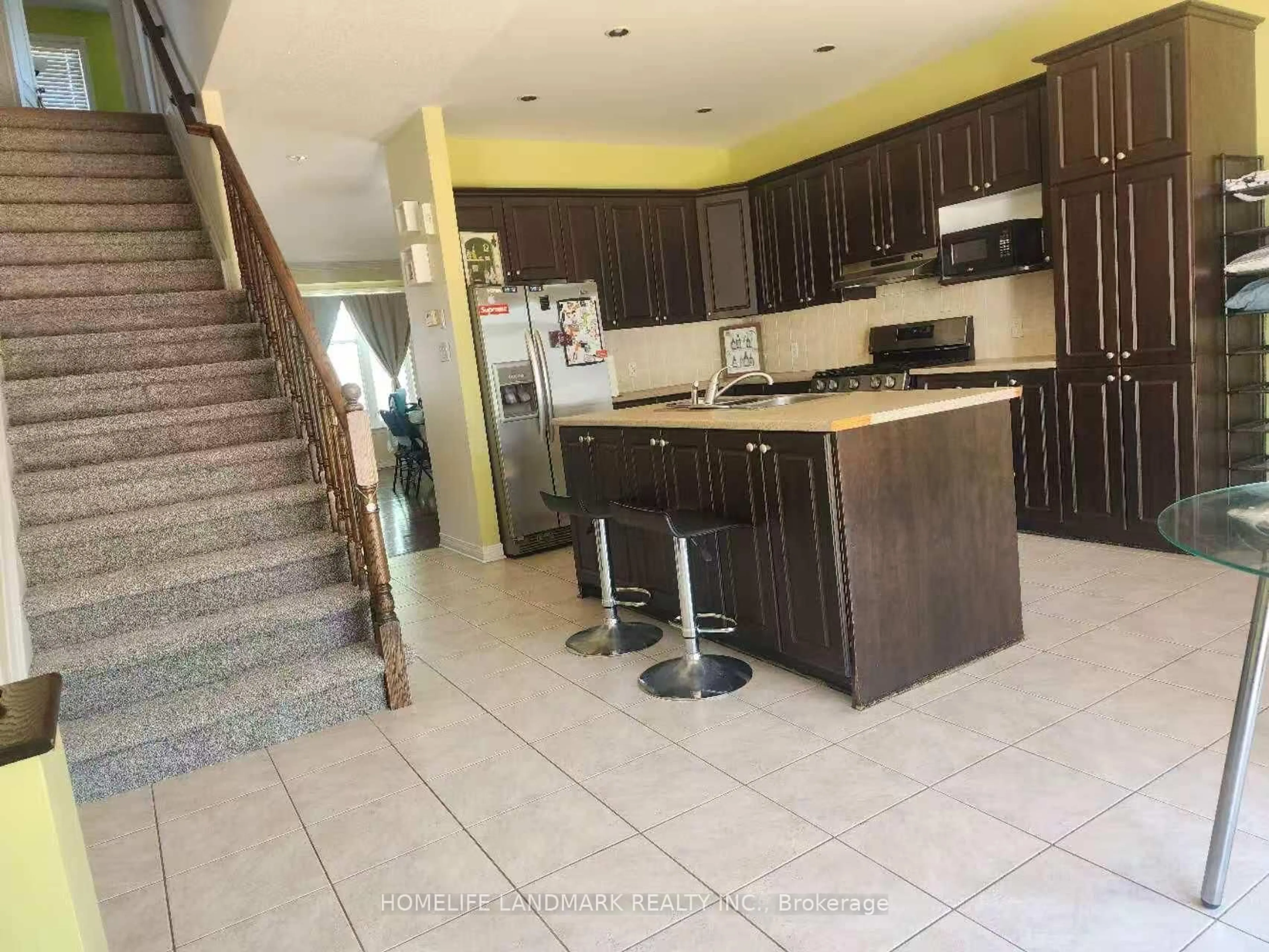 Open concept kitchen, ceramic/tile floor for 919 LONGFIELDS Dr, Ottawa Ontario K2J 5K6