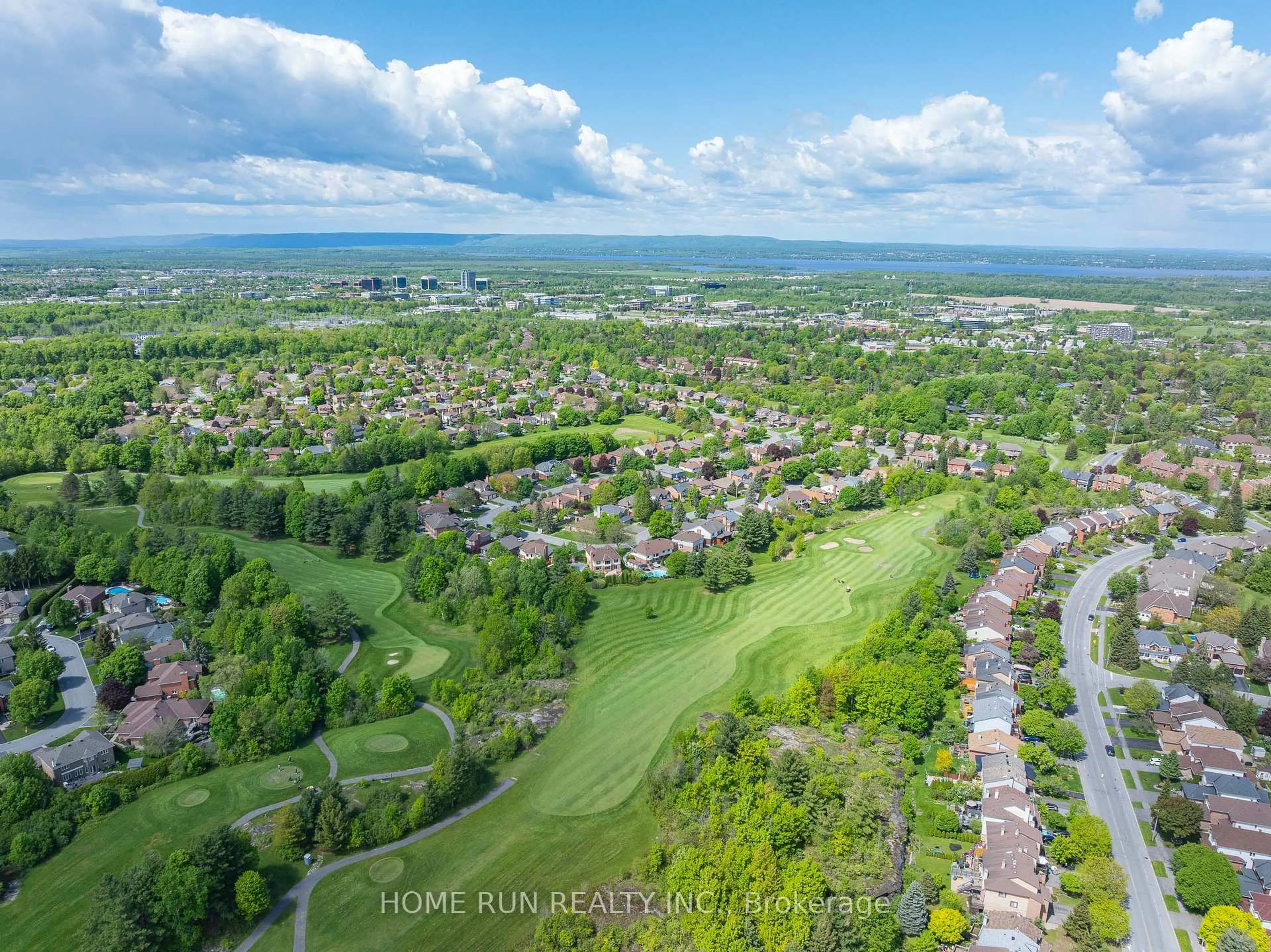 A pic from outside/outdoor area/front of a property/back of a property/a pic from drone, water/lake/river/ocean view for 6 Zokol Cres, Ottawa Ontario K2K 2K5