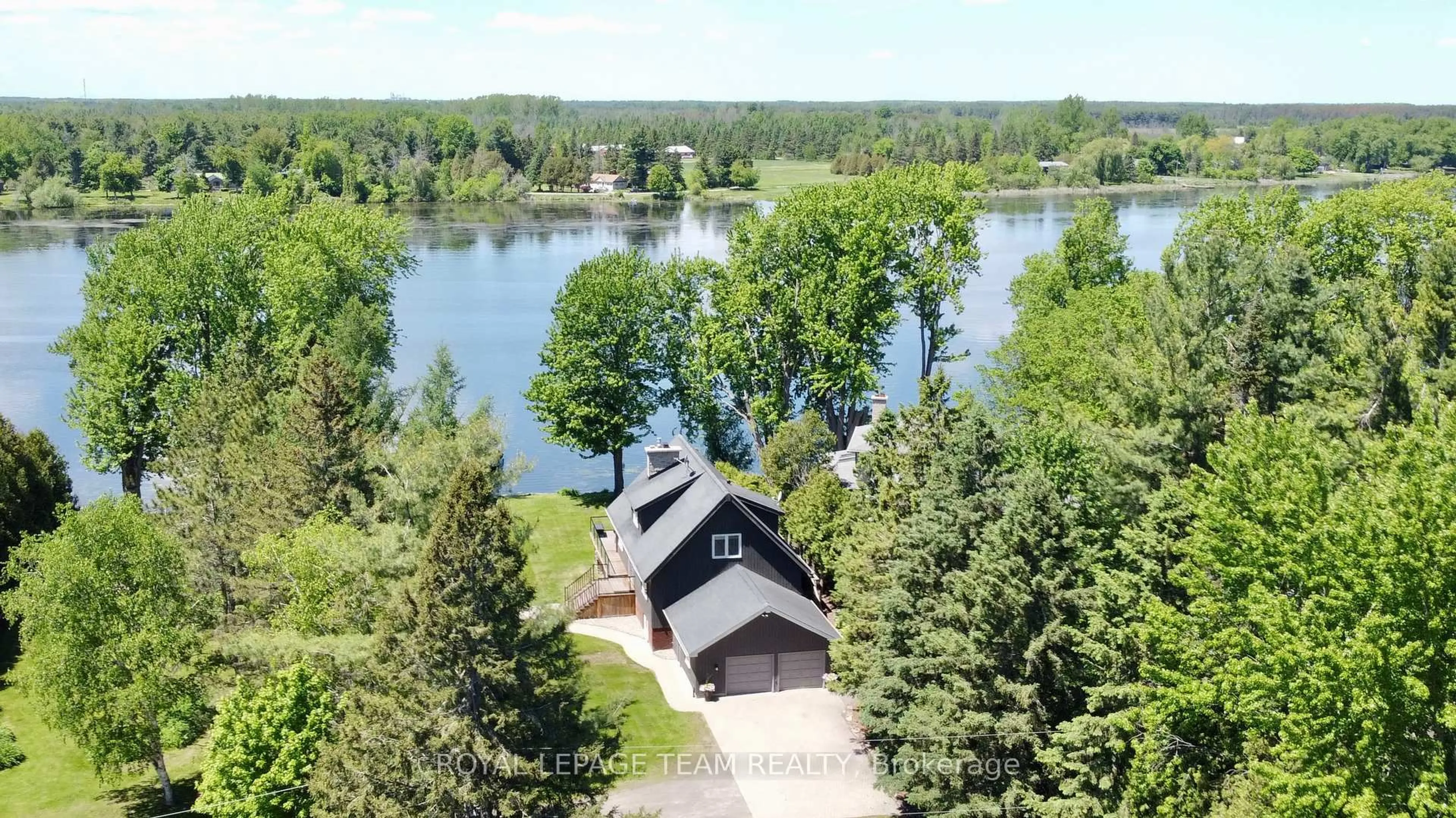 A pic from outside/outdoor area/front of a property/back of a property/a pic from drone, water/lake/river/ocean view for 3758 Mapleshore Dr, North Grenville Ontario K0G 1J0