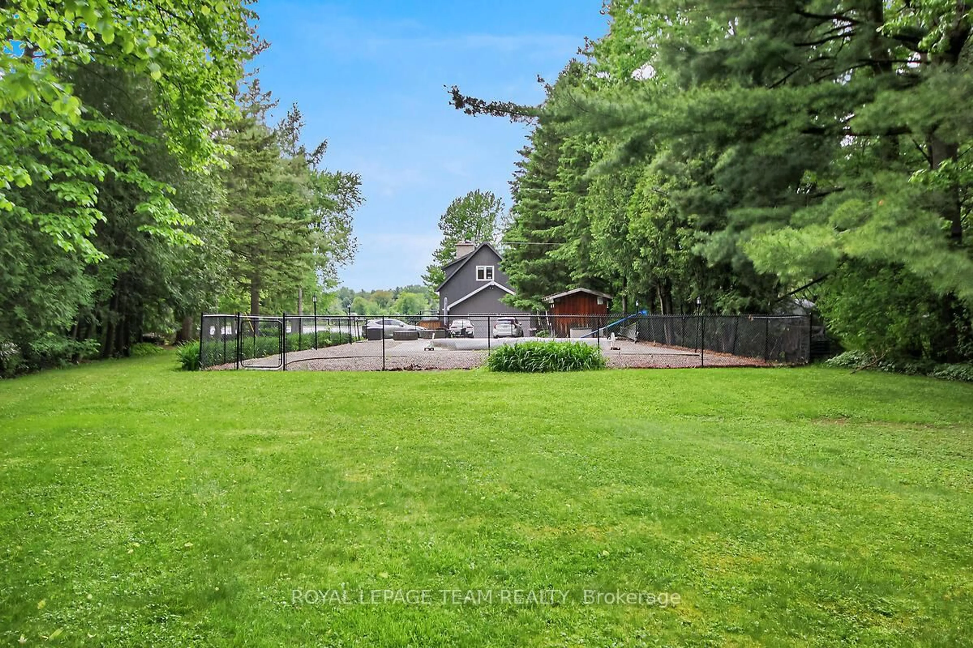 A pic from outside/outdoor area/front of a property/back of a property/a pic from drone, water/lake/river/ocean view for 3758 Mapleshore Dr, North Grenville Ontario K0G 1J0