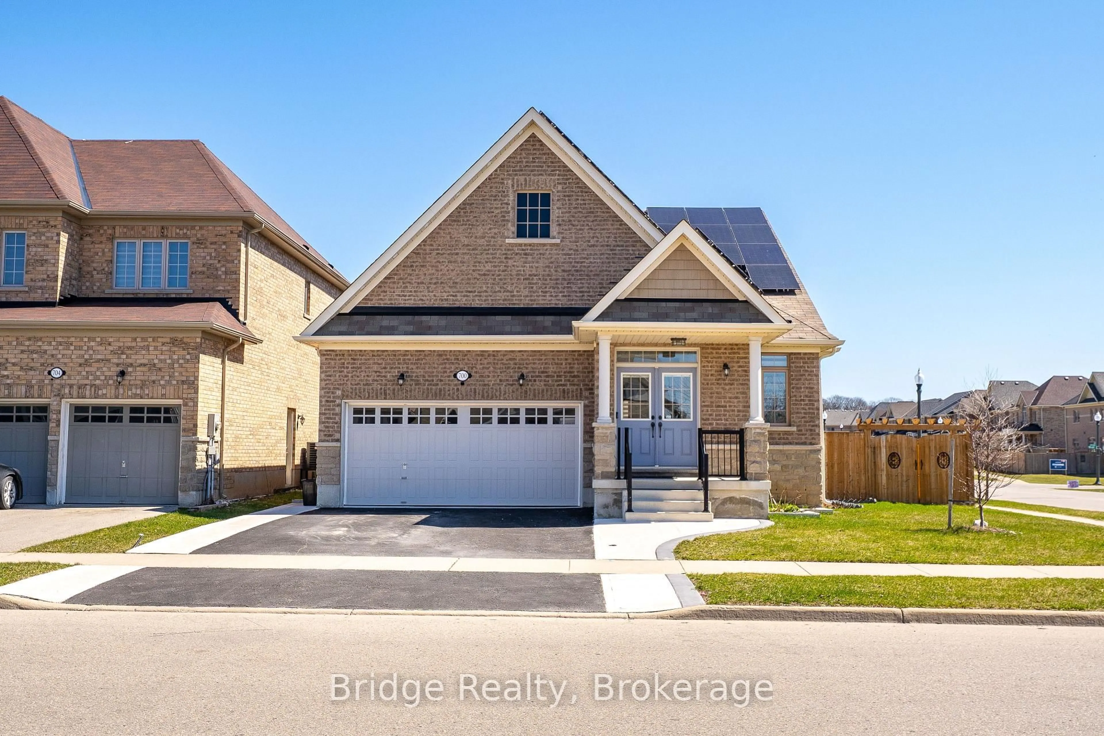 Home with brick exterior material, street for 700 Arthur Parker Ave, Woodstock Ontario N4S 7W2