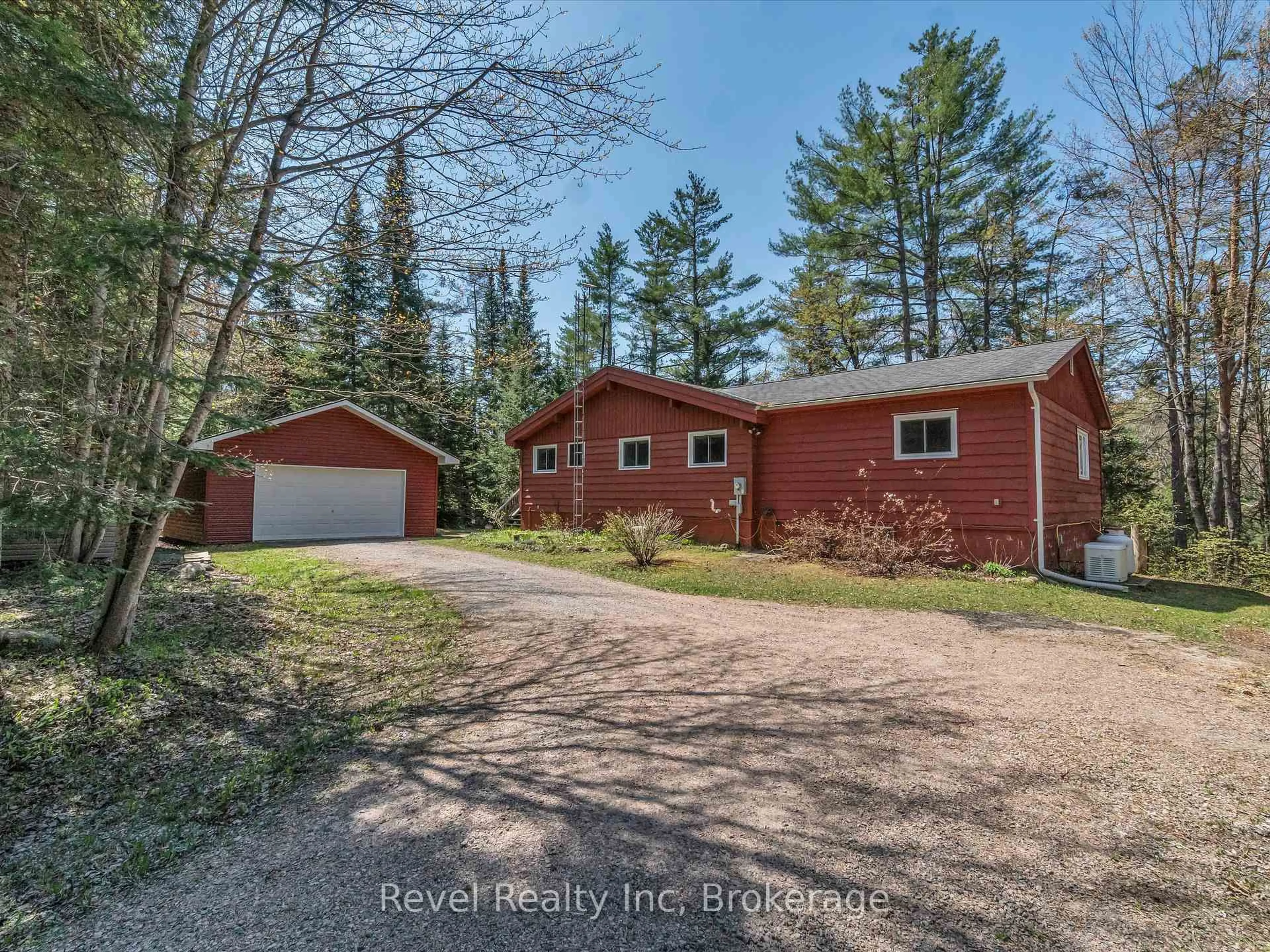 A pic from outside/outdoor area/front of a property/back of a property/a pic from drone, forest/trees view for 1234 Miriam Dr, Bracebridge Ontario P1L 1X1