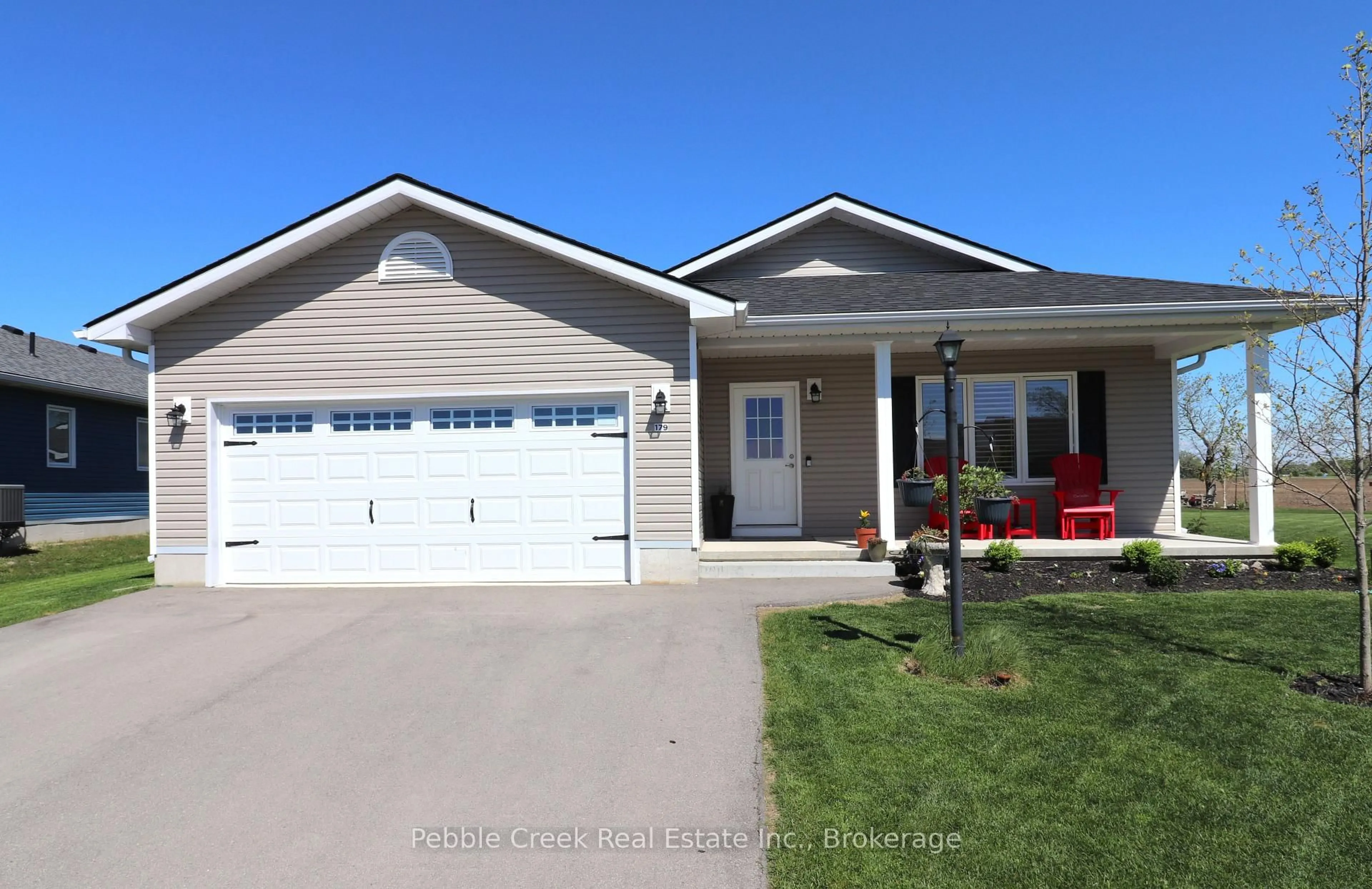 Home with vinyl exterior material, street for 179 Lake Breeze Dr, Ashfield-Colborne-Wawanosh Ontario N7A 0C6