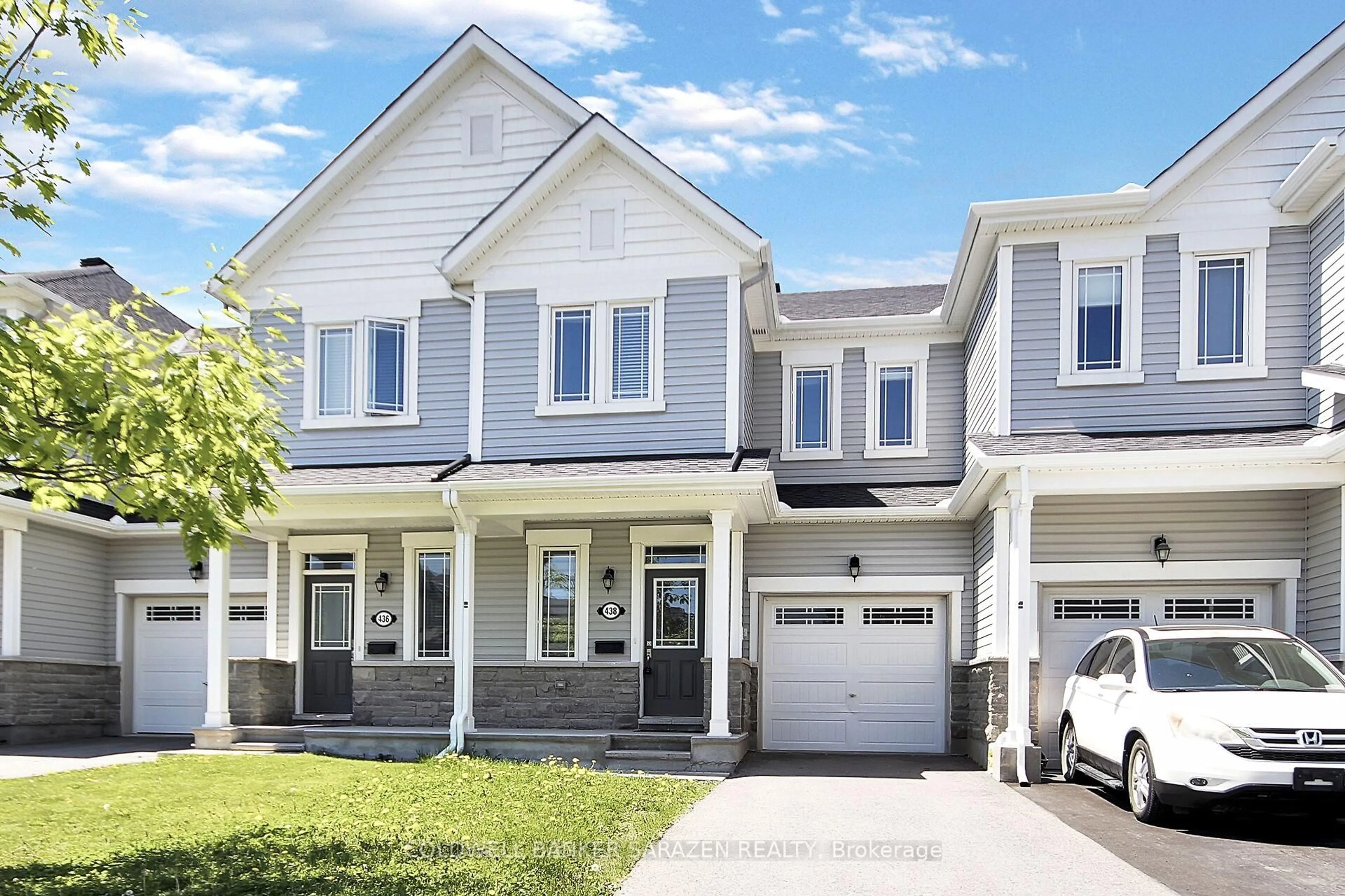 Home with vinyl exterior material, street for 438 Meadowbreeze Dr, Ottawa Ontario K2M 2T6