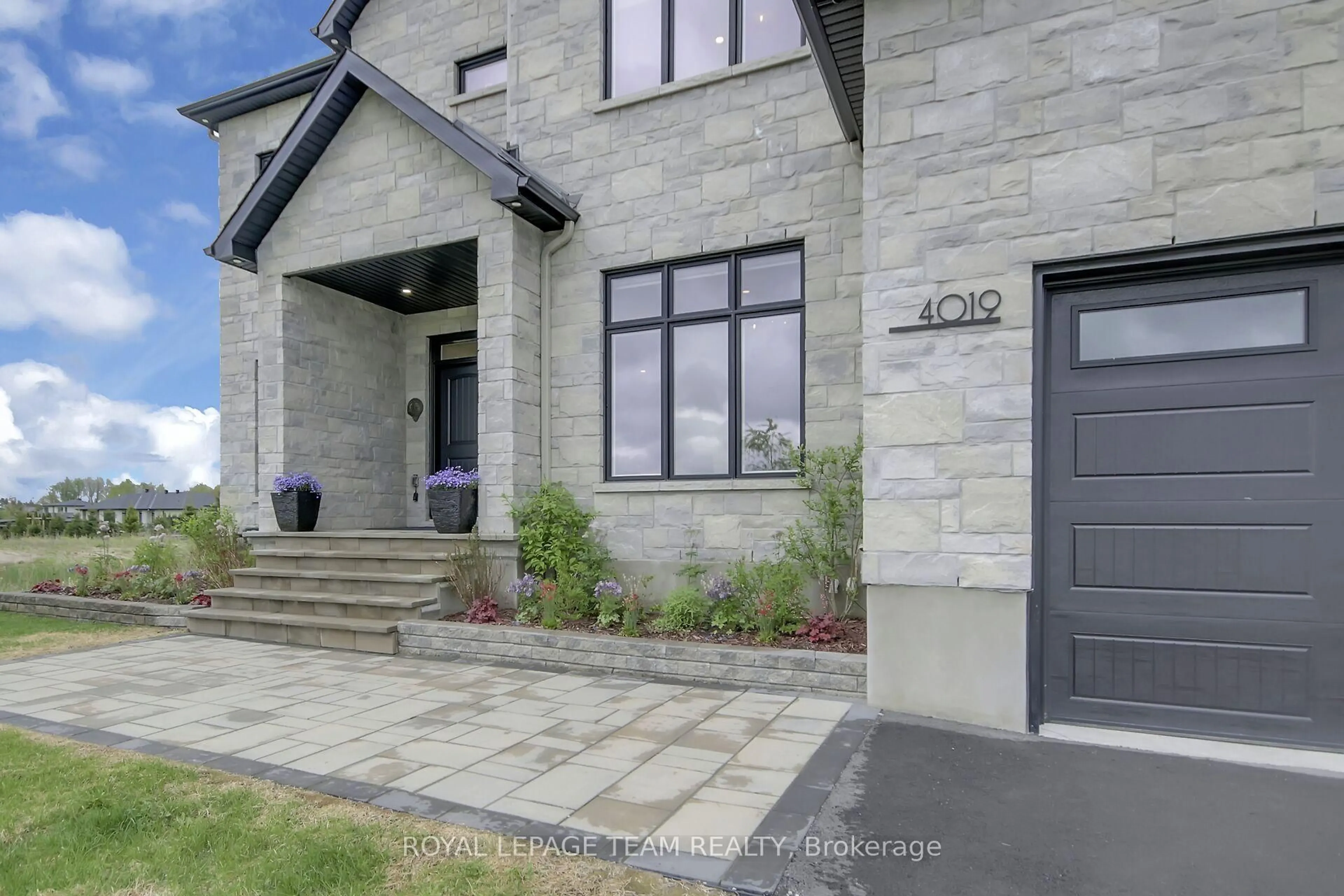Home with brick exterior material, street for 4019 Perennial Way, Ottawa Ontario K4P 0G7