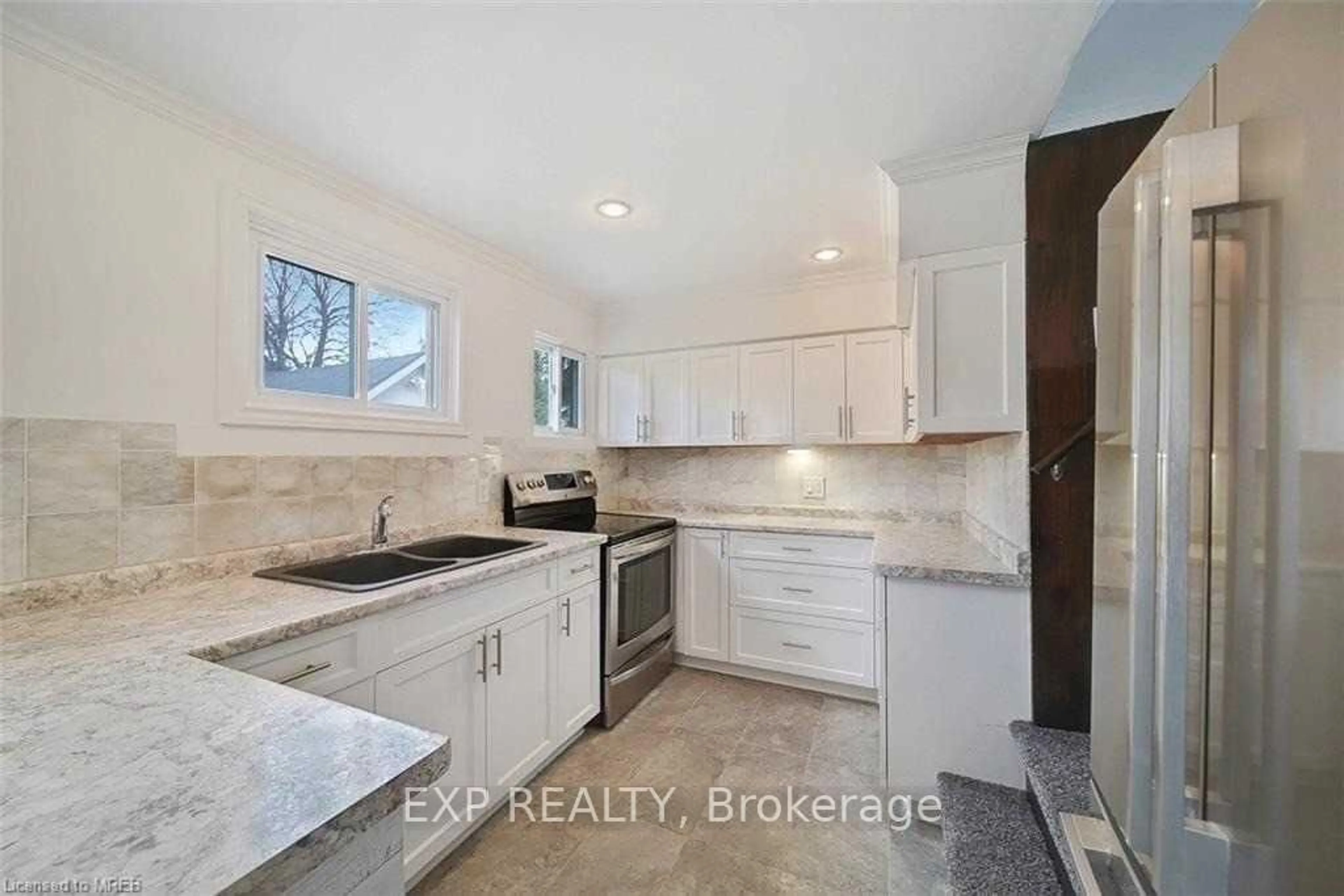 Open concept kitchen, ceramic/tile floor for 6525 Oneil St, Niagara Falls Ontario L2J 1M7