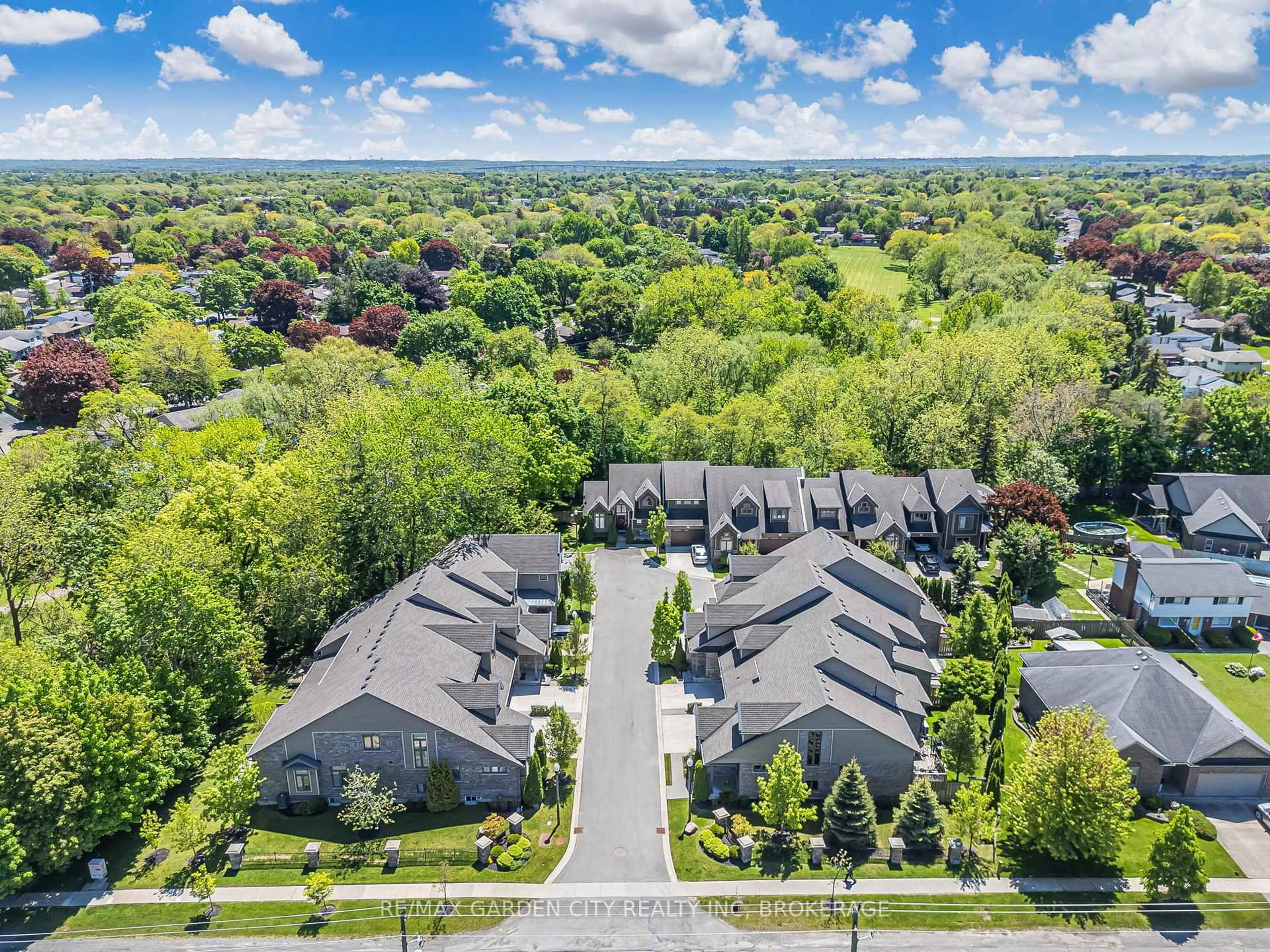 A pic from outside/outdoor area/front of a property/back of a property/a pic from drone, unknown for 140 Parnell Rd #102, St. Catharines Ontario L2M 1V4