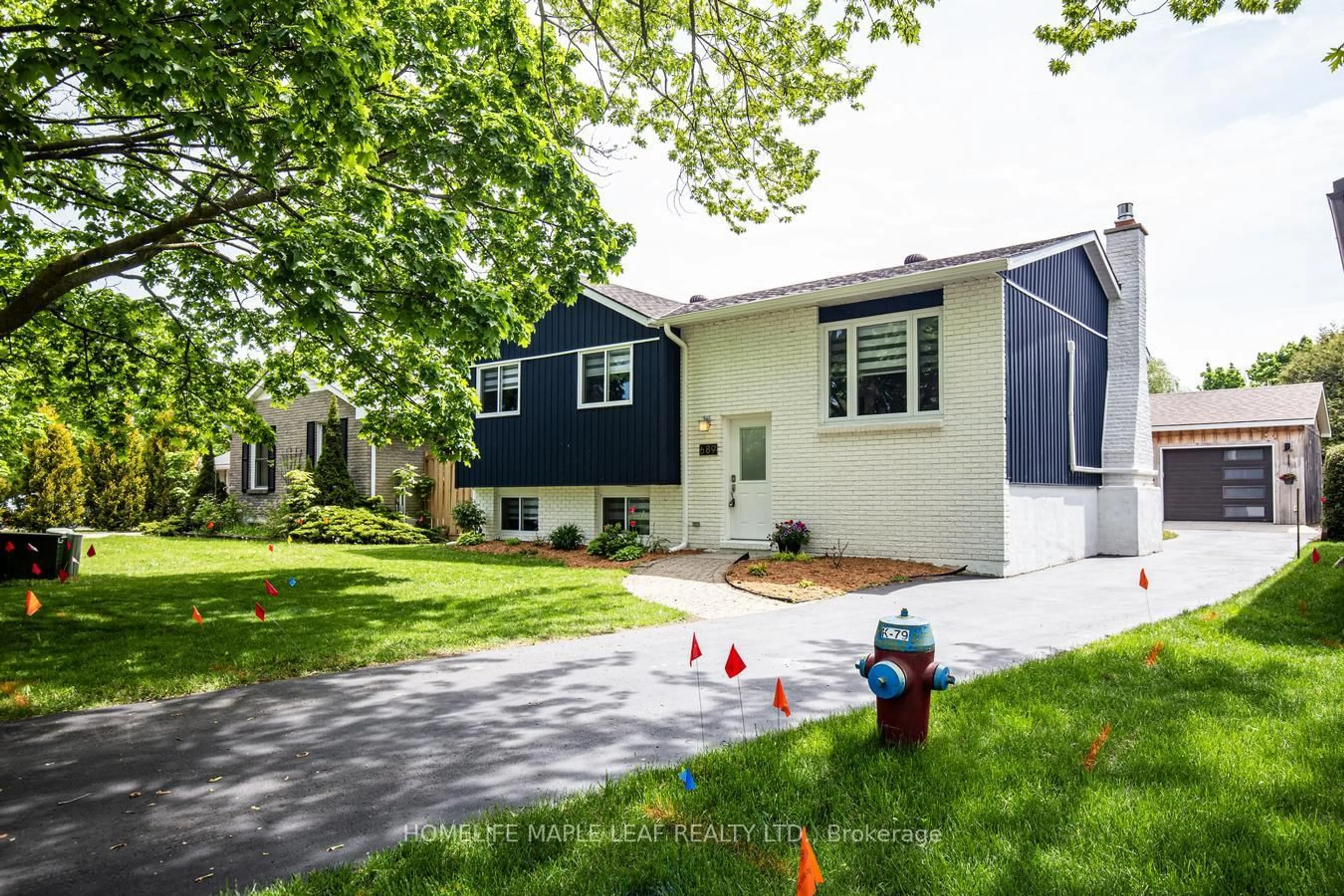 Home with vinyl exterior material, street for 689 Macyoung Dr, Kincardine Ontario N2Z 1T1