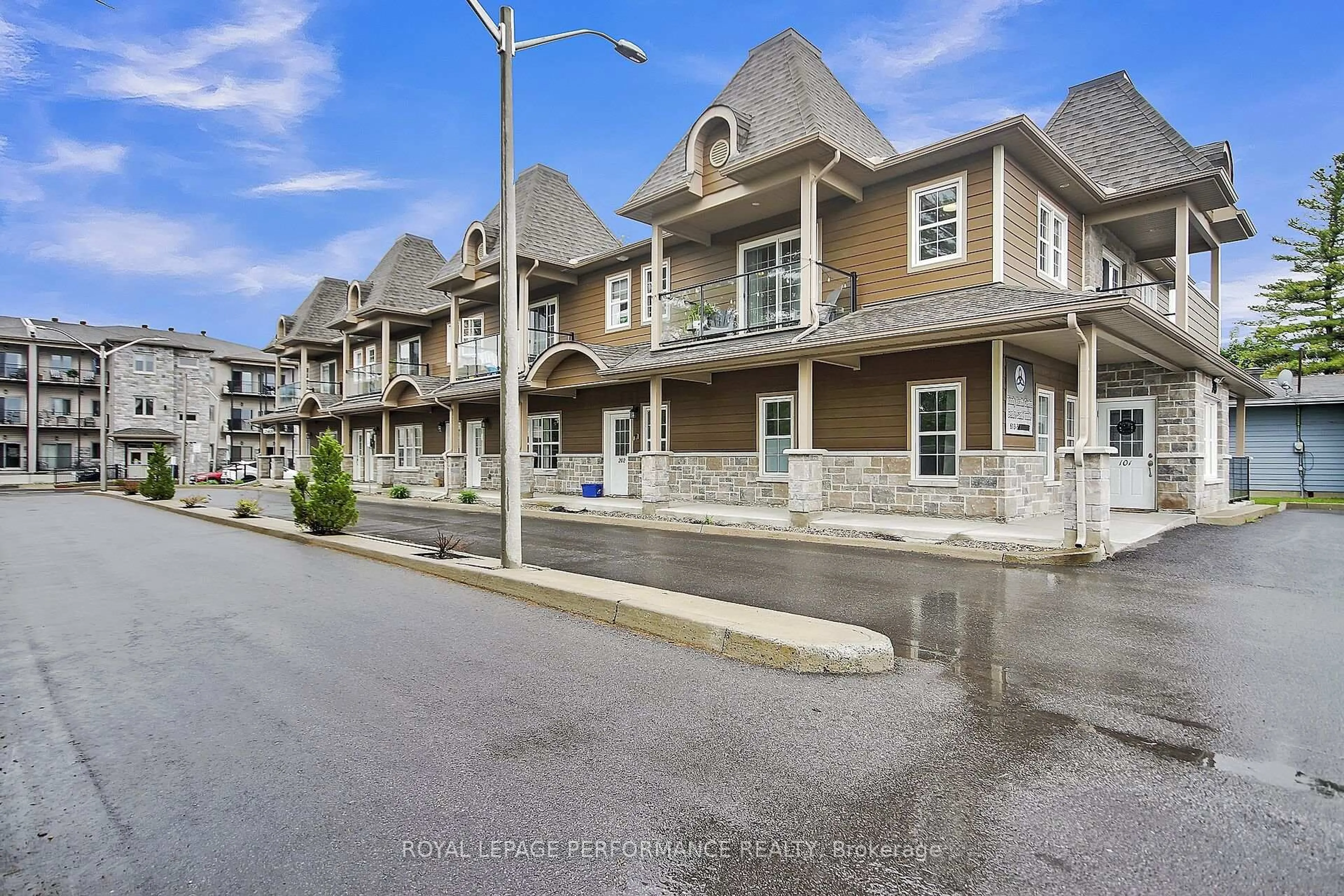 A pic from outside/outdoor area/front of a property/back of a property/a pic from drone, street for 245 Equinox Dr #201, Russell Ontario K0A 1W1
