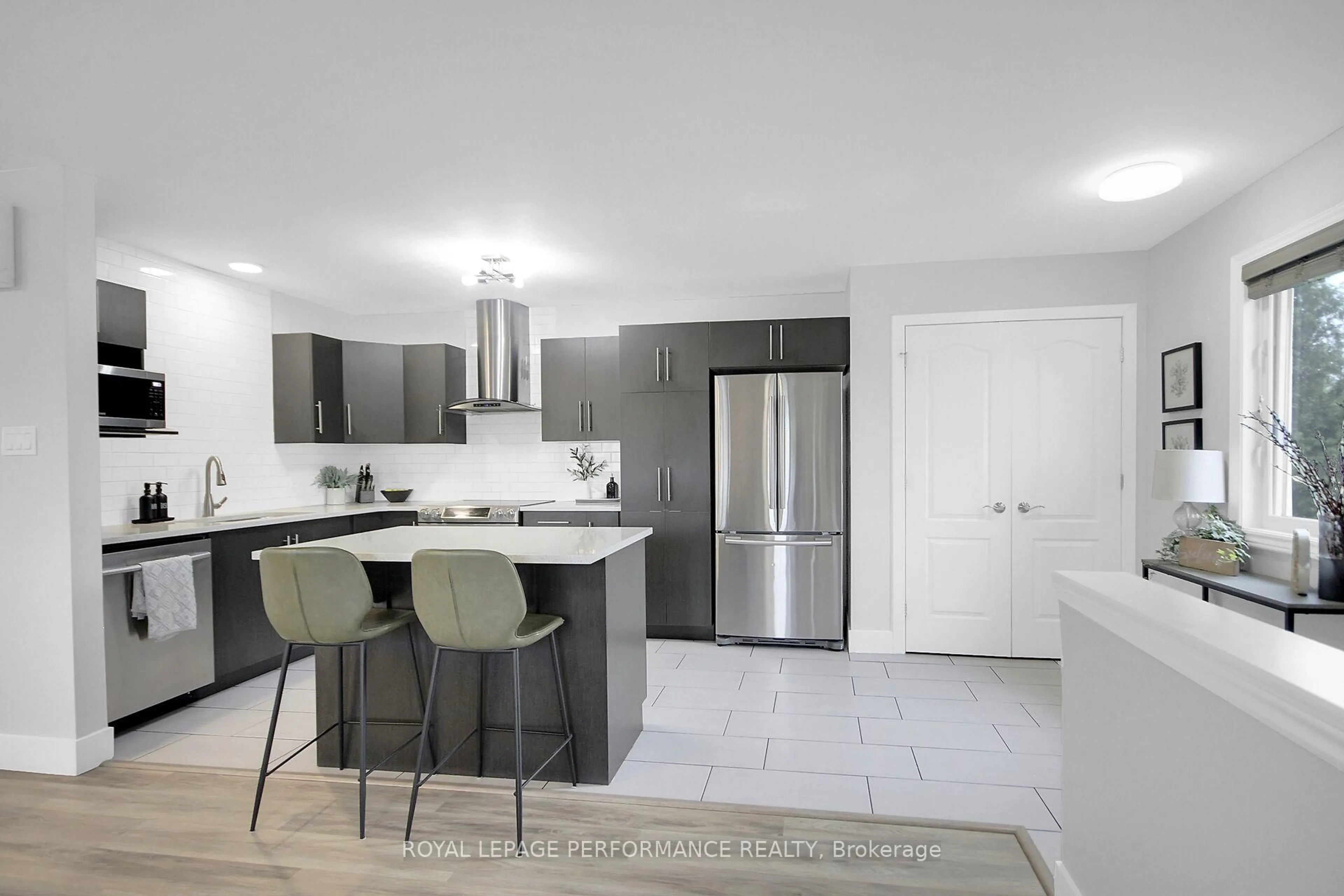 Open concept kitchen, ceramic/tile floor for 245 Equinox Dr #201, Russell Ontario K0A 1W1