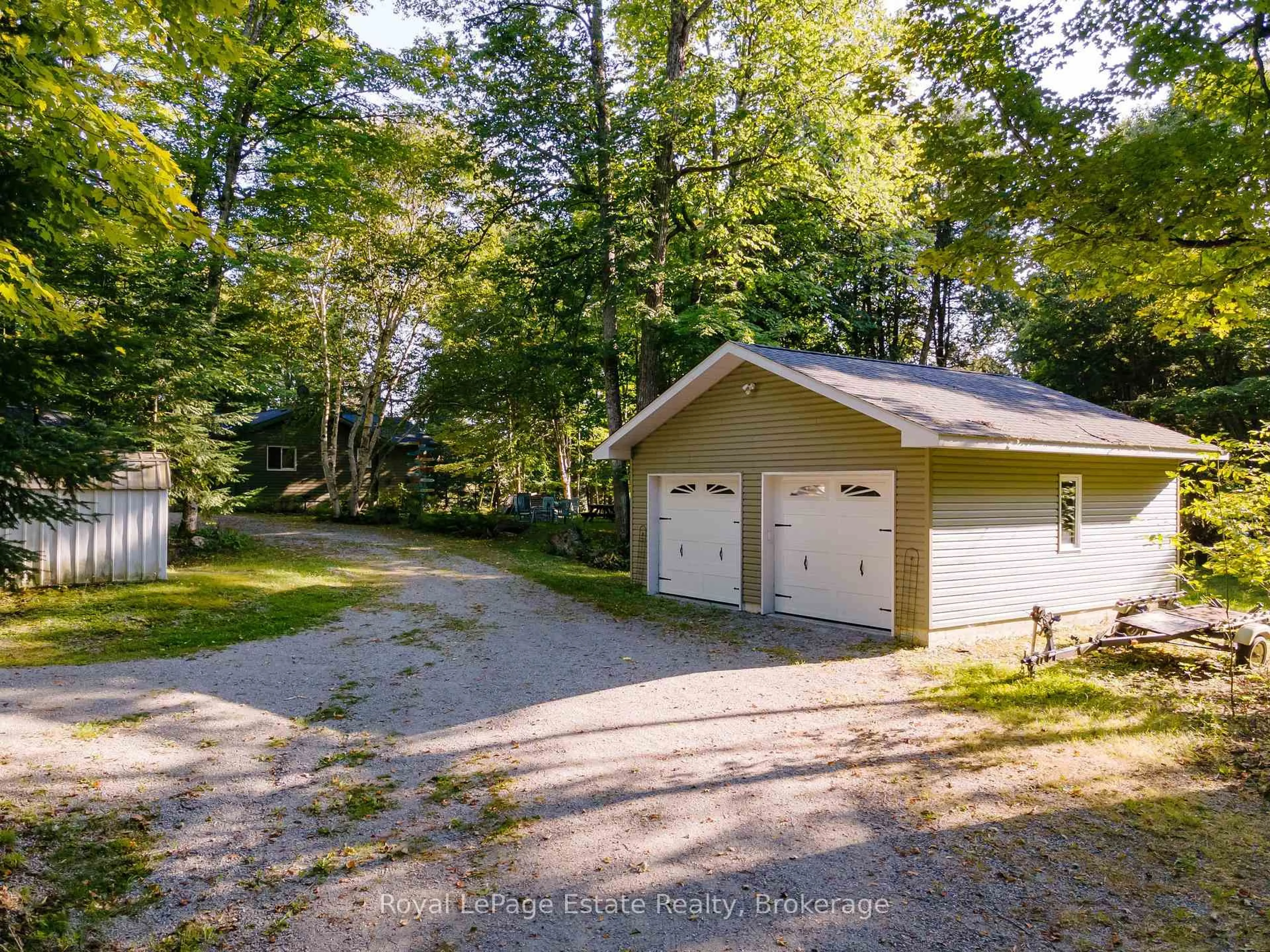 A pic from outside/outdoor area/front of a property/back of a property/a pic from drone, unknown for 1157 Between Lakes Tr, Minden Hills Ontario K0M 1J1