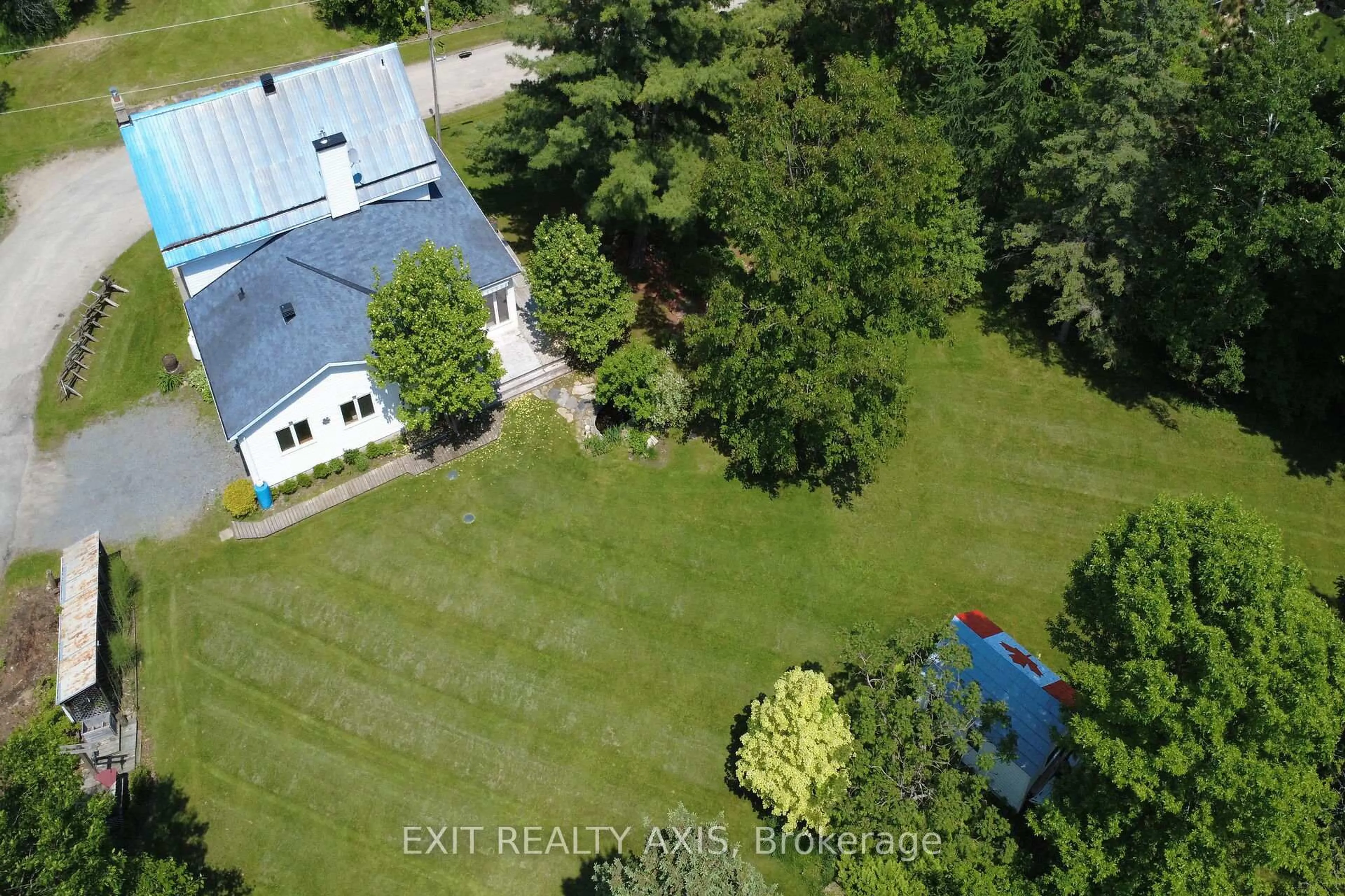 A pic from outside/outdoor area/front of a property/back of a property/a pic from drone, unknown for 21 Main St, Rideau Lakes Ontario K0G 1P0