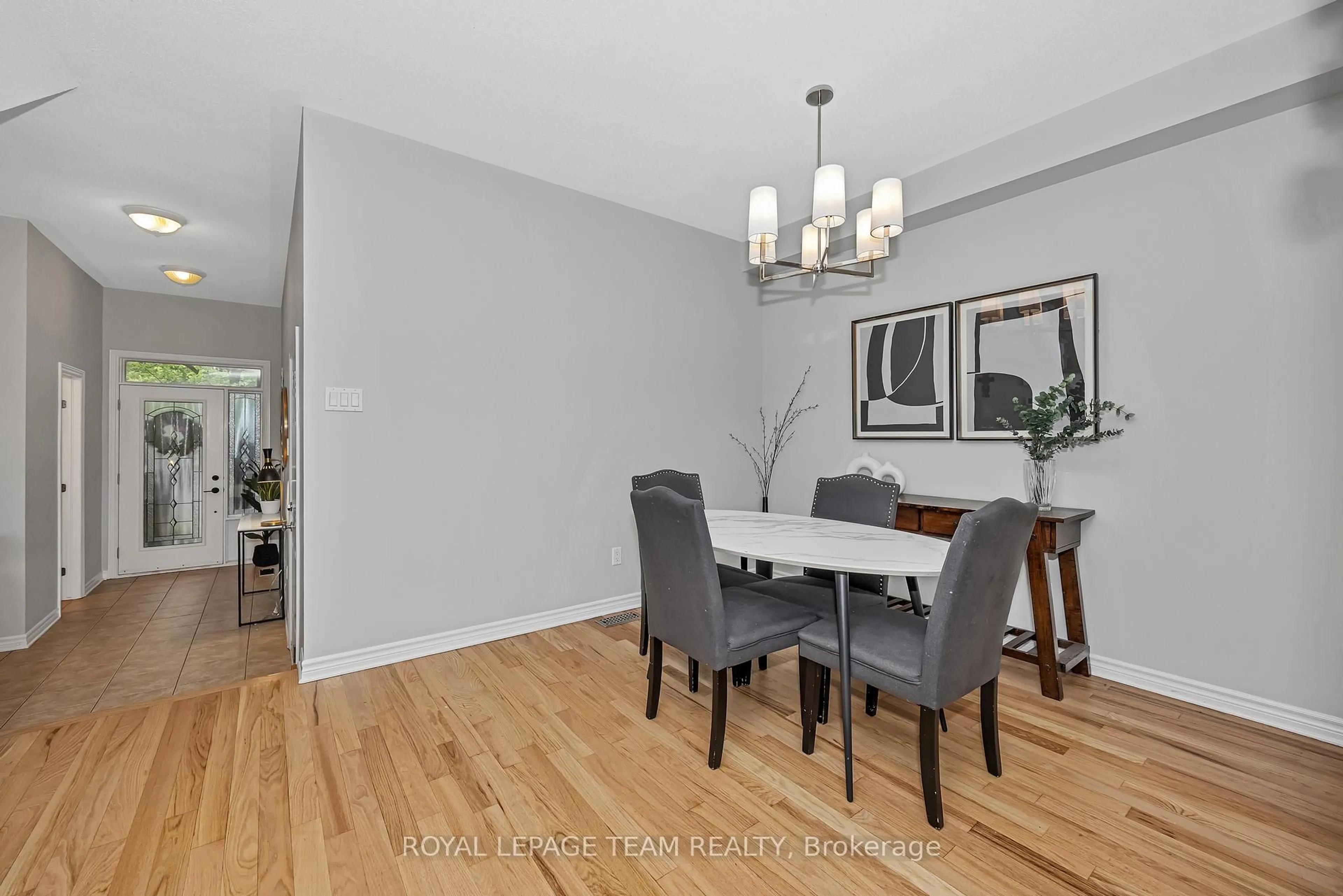 Dining room, wood/laminate floor for 91 Whetstone Cres, Ottawa Ontario K2G 7C4