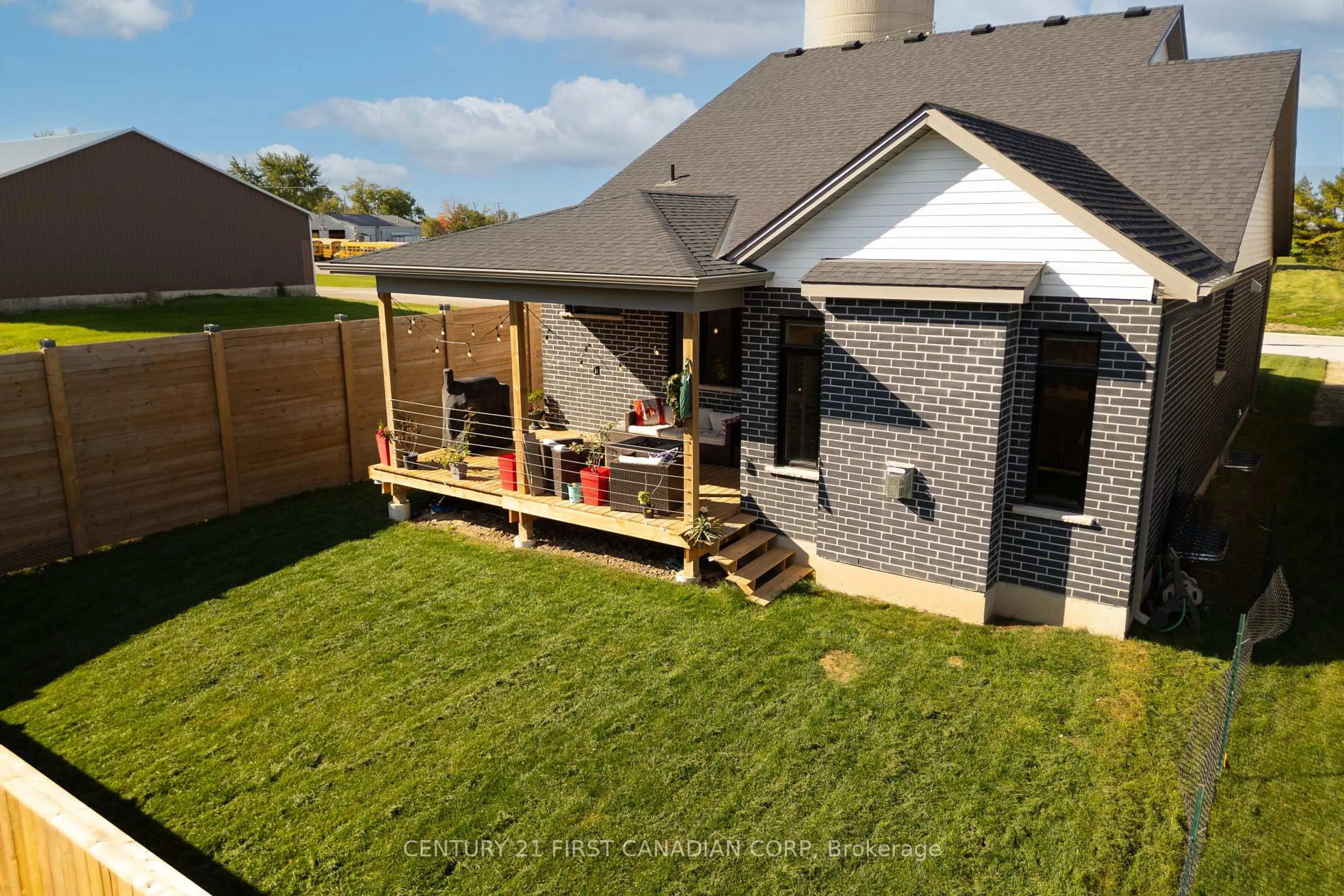 A pic from outside/outdoor area/front of a property/back of a property/a pic from drone, unknown for 128 Scotts Dr, Lucan Biddulph Ontario N0M 2J0