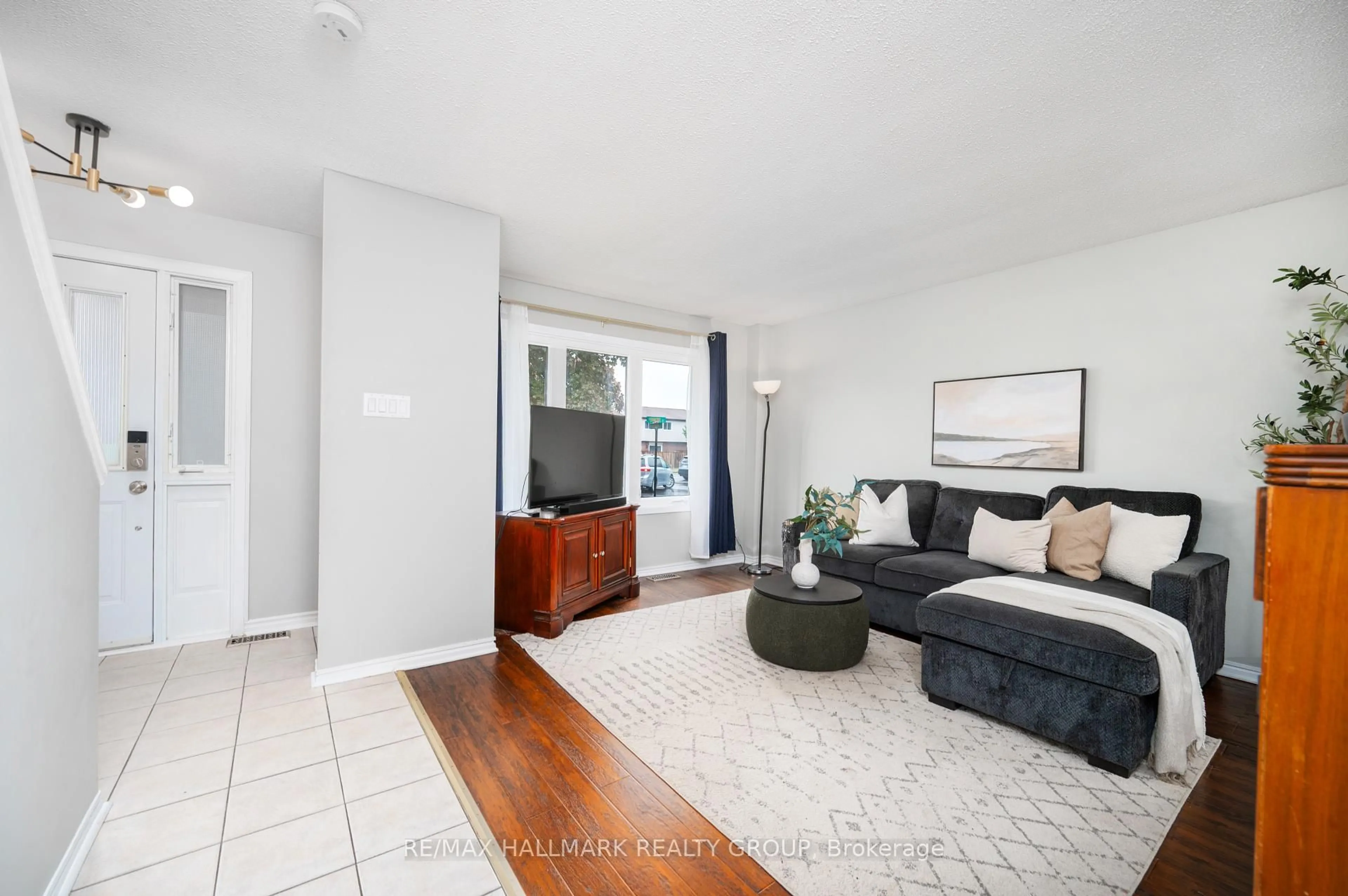 Living room with furniture, unknown for 3150 Fenmore St #1, Ottawa Ontario K1T 1S5