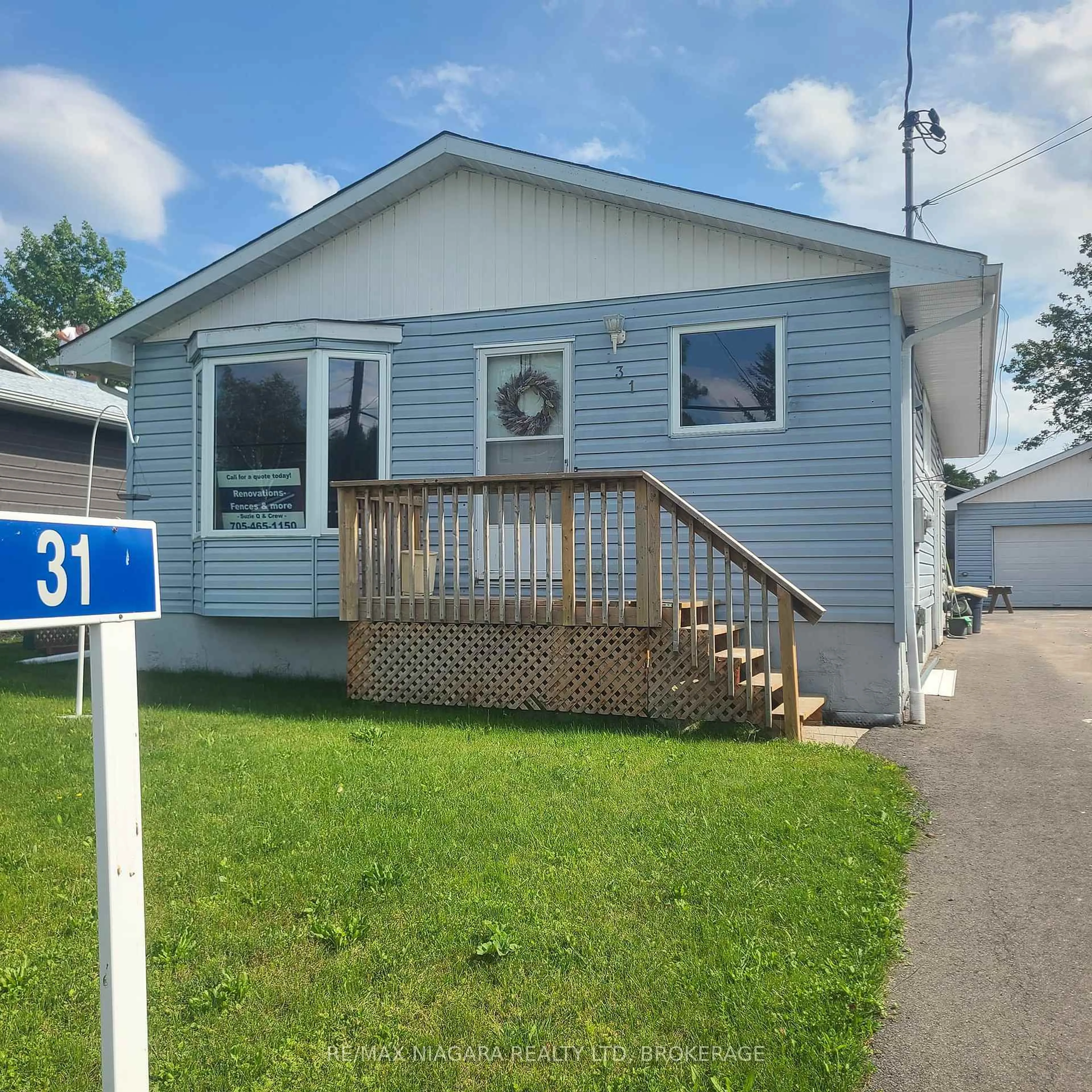 Home with vinyl exterior material, street for 31 Spruce Dr, Temagami Ontario P0H 2H0