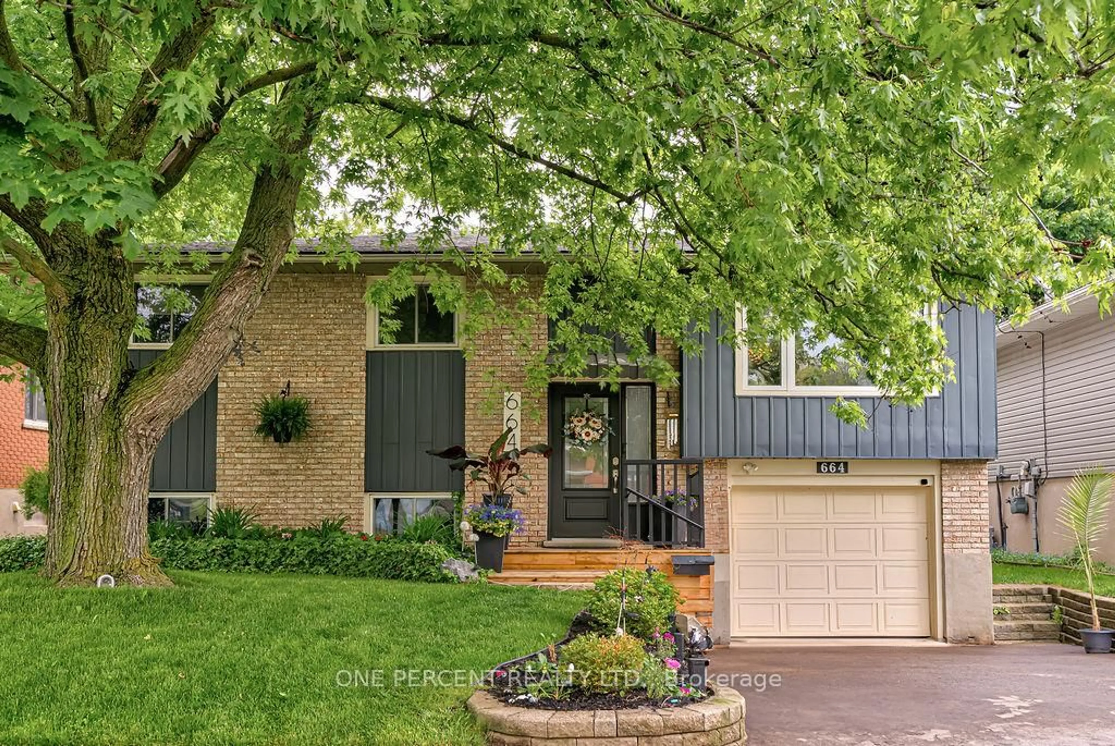 Home with brick exterior material, street for 664 Highpoint Ave, Waterloo Ontario N2L 4Z5