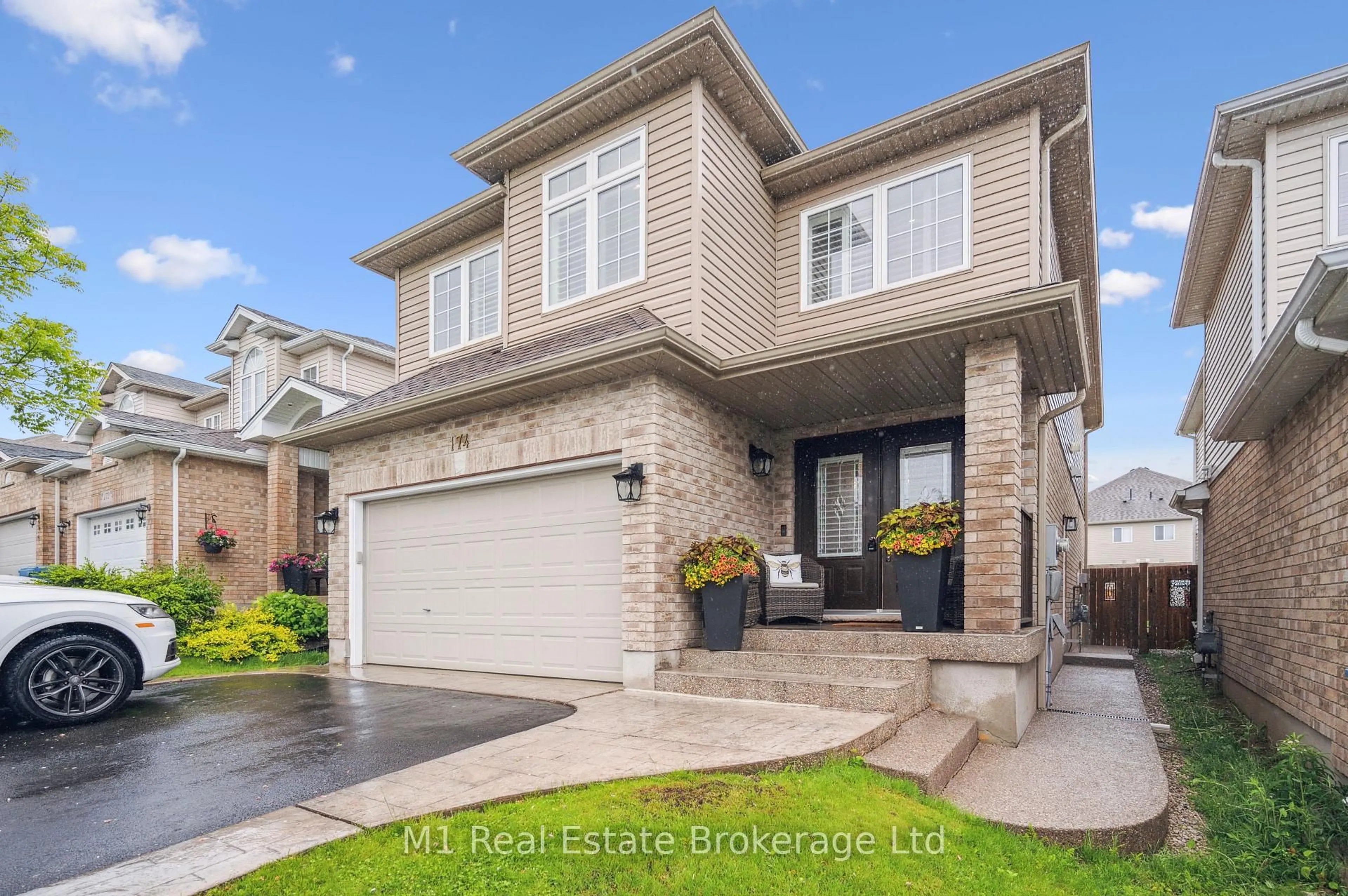 Home with brick exterior material, street for 174 Curzon Cres, Guelph Ontario N1K 0B5