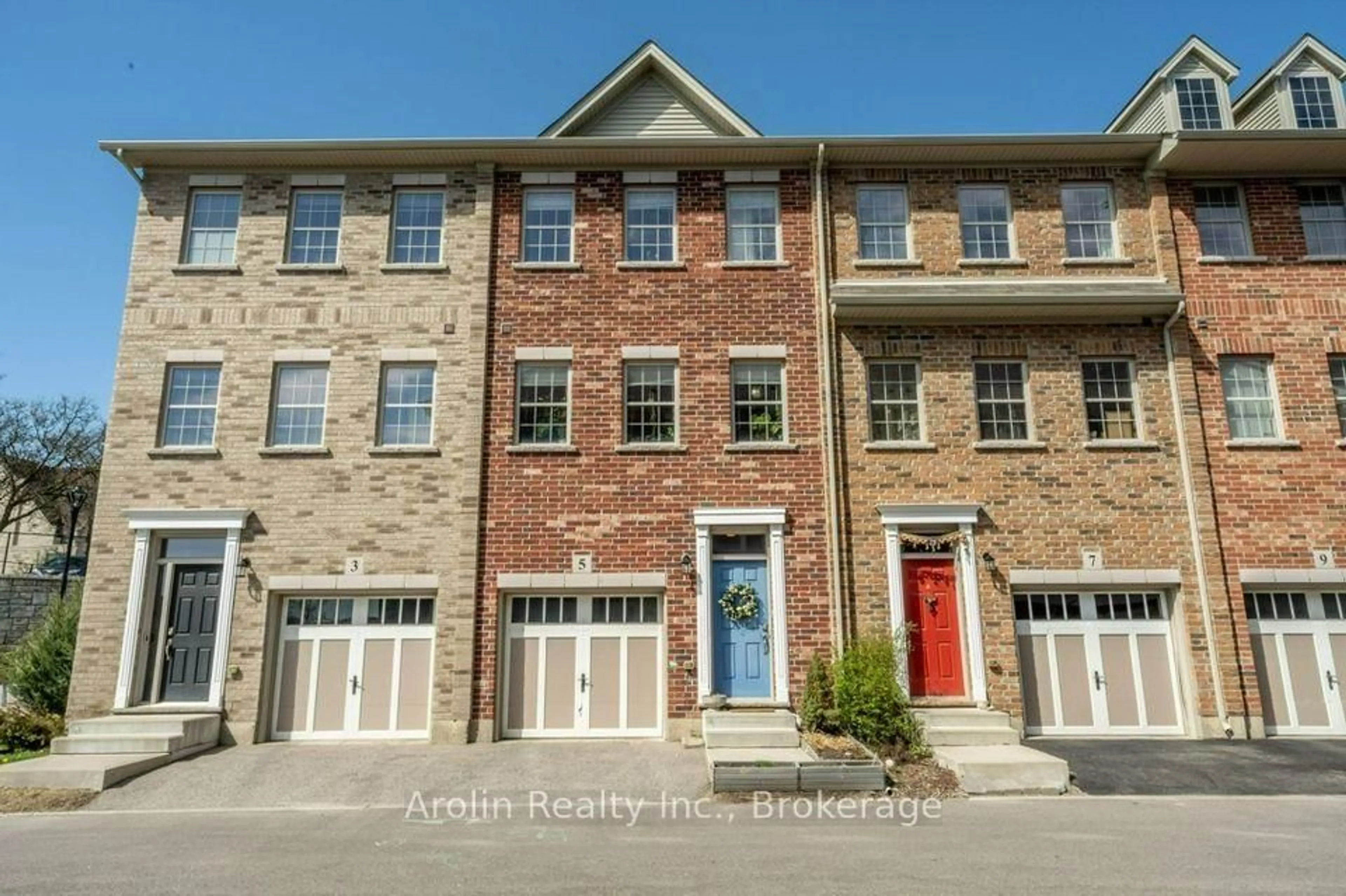 Home with brick exterior material, street for 5 Oxfordshire Lane, Kitchener Ontario N2H 0B4