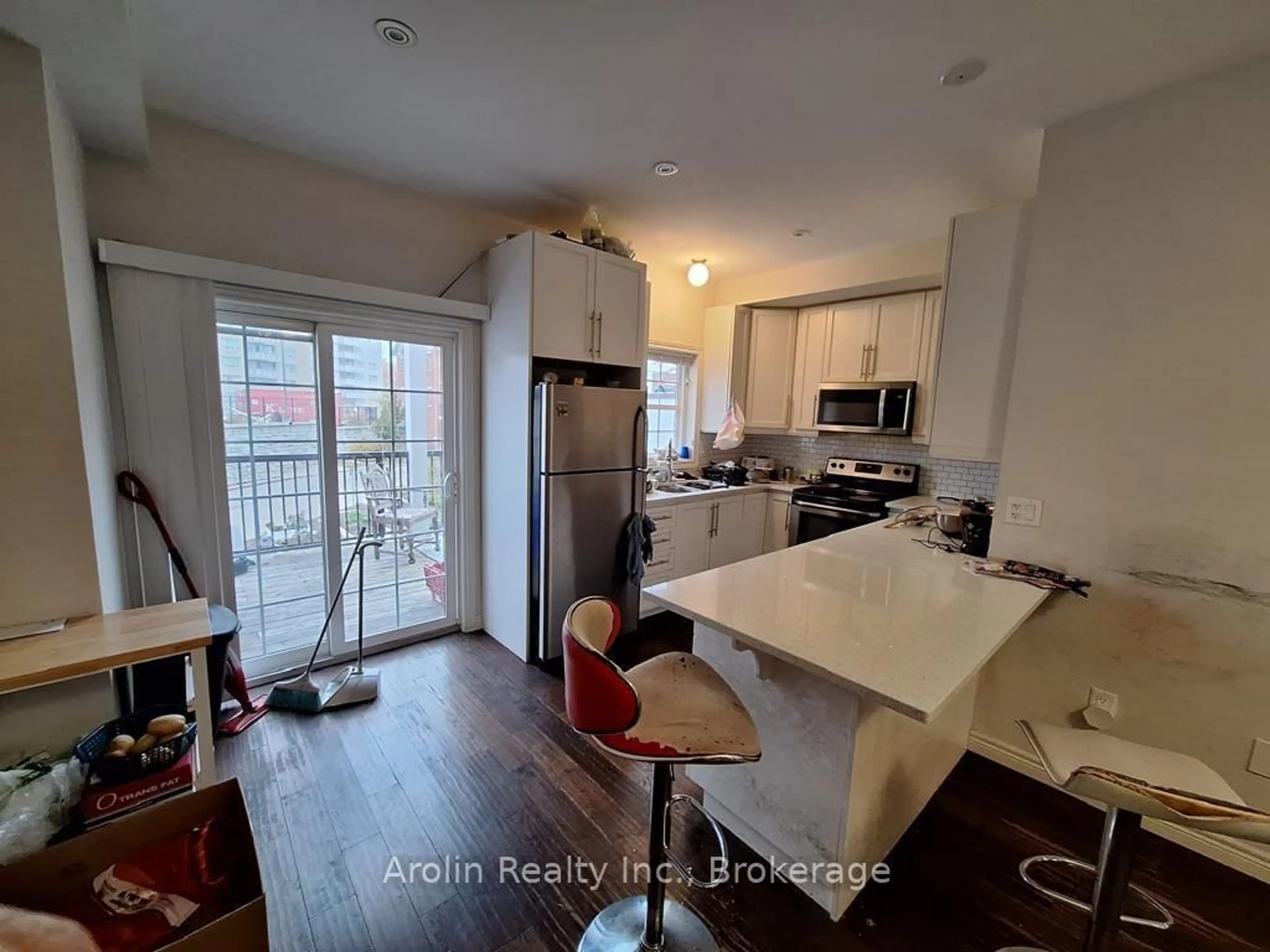 Open concept kitchen, wood/laminate floor for 5 Oxfordshire Lane, Kitchener Ontario N2H 0B4