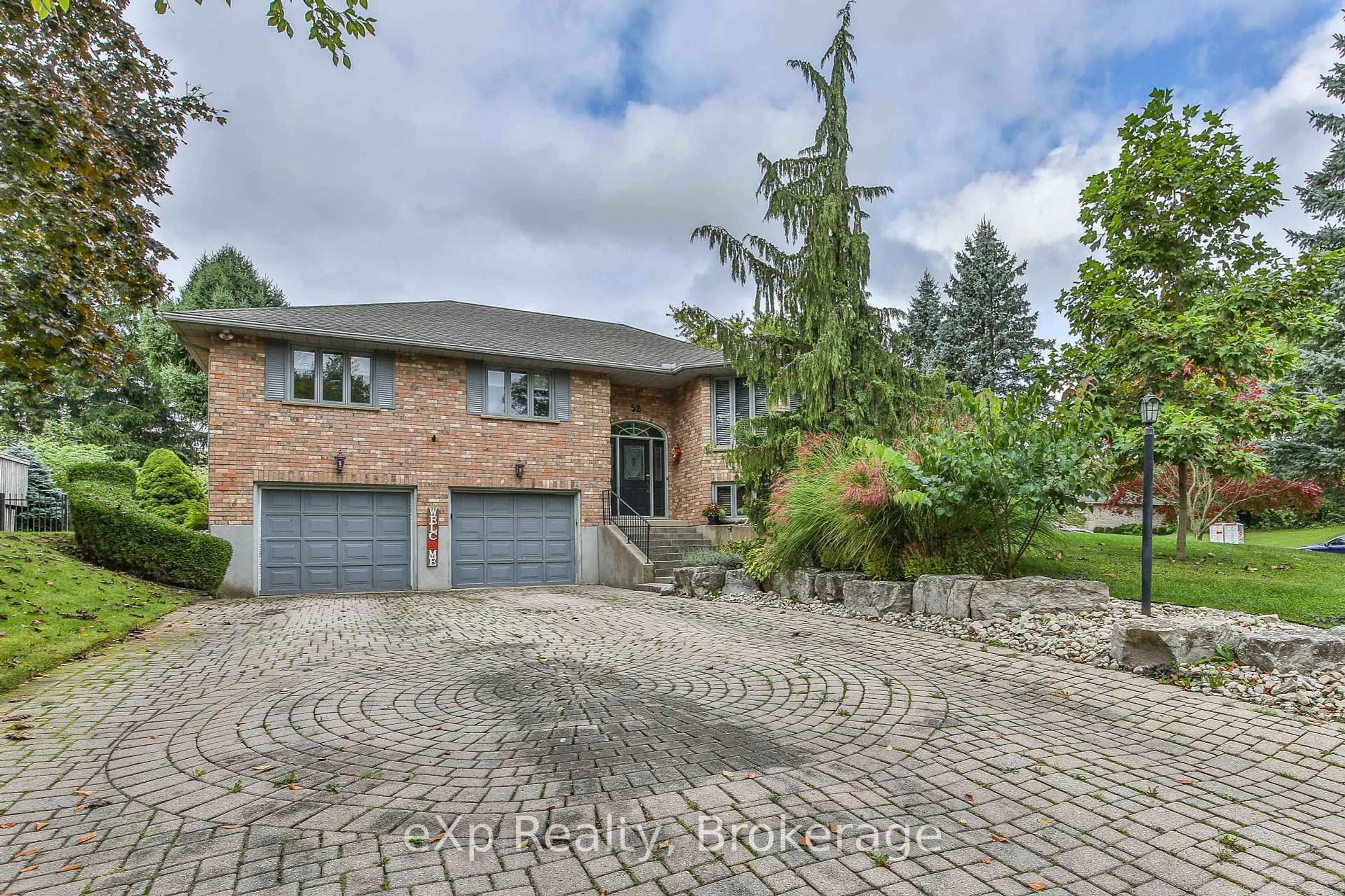 Home with brick exterior material, street for 52 Tanager Dr, Tillsonburg Ontario N4G 5J6