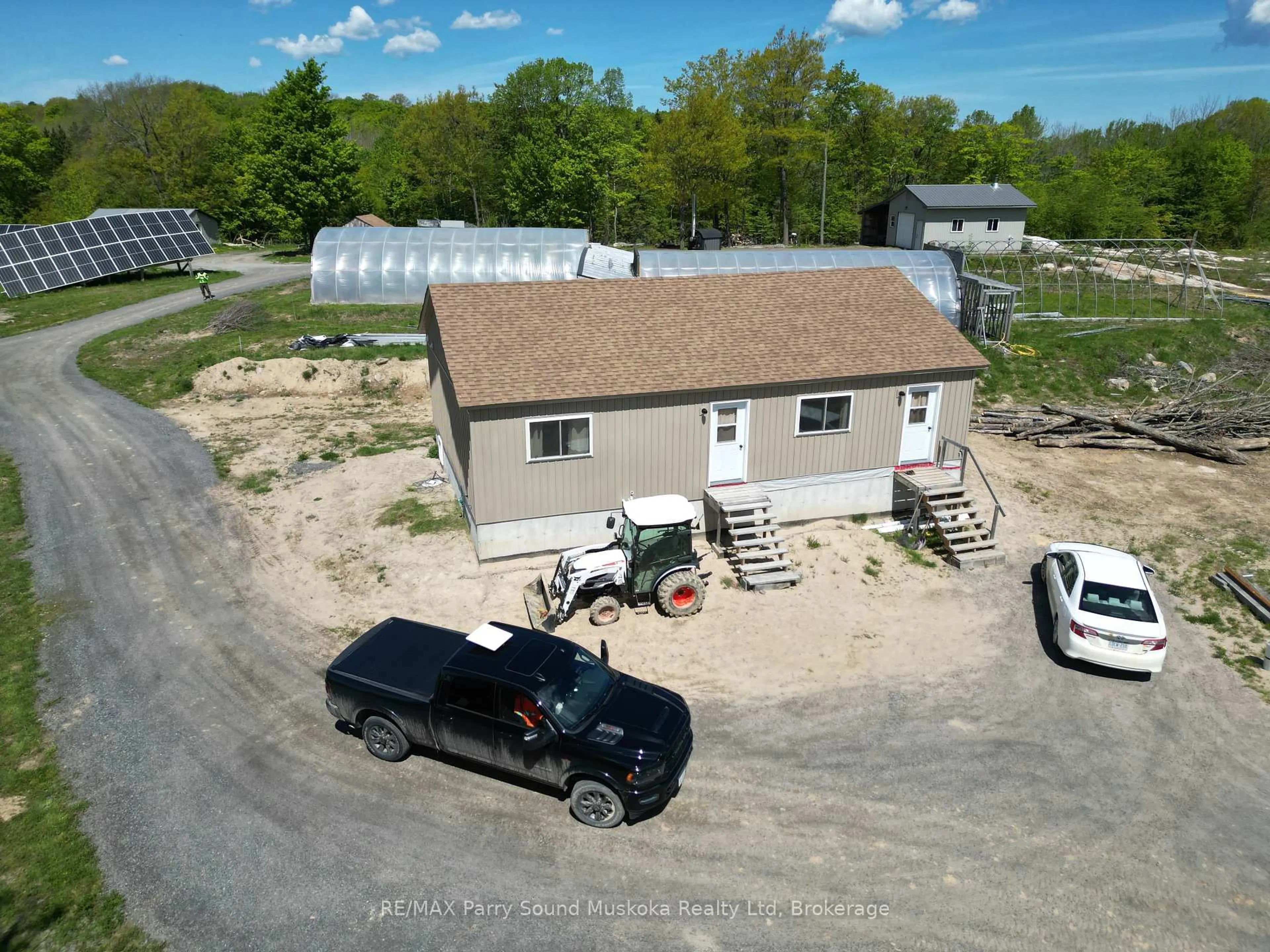 A pic from outside/outdoor area/front of a property/back of a property/a pic from drone, building for 791 Clear Lake Rd, Parry Sound Remote Area Ontario P0H 1A0