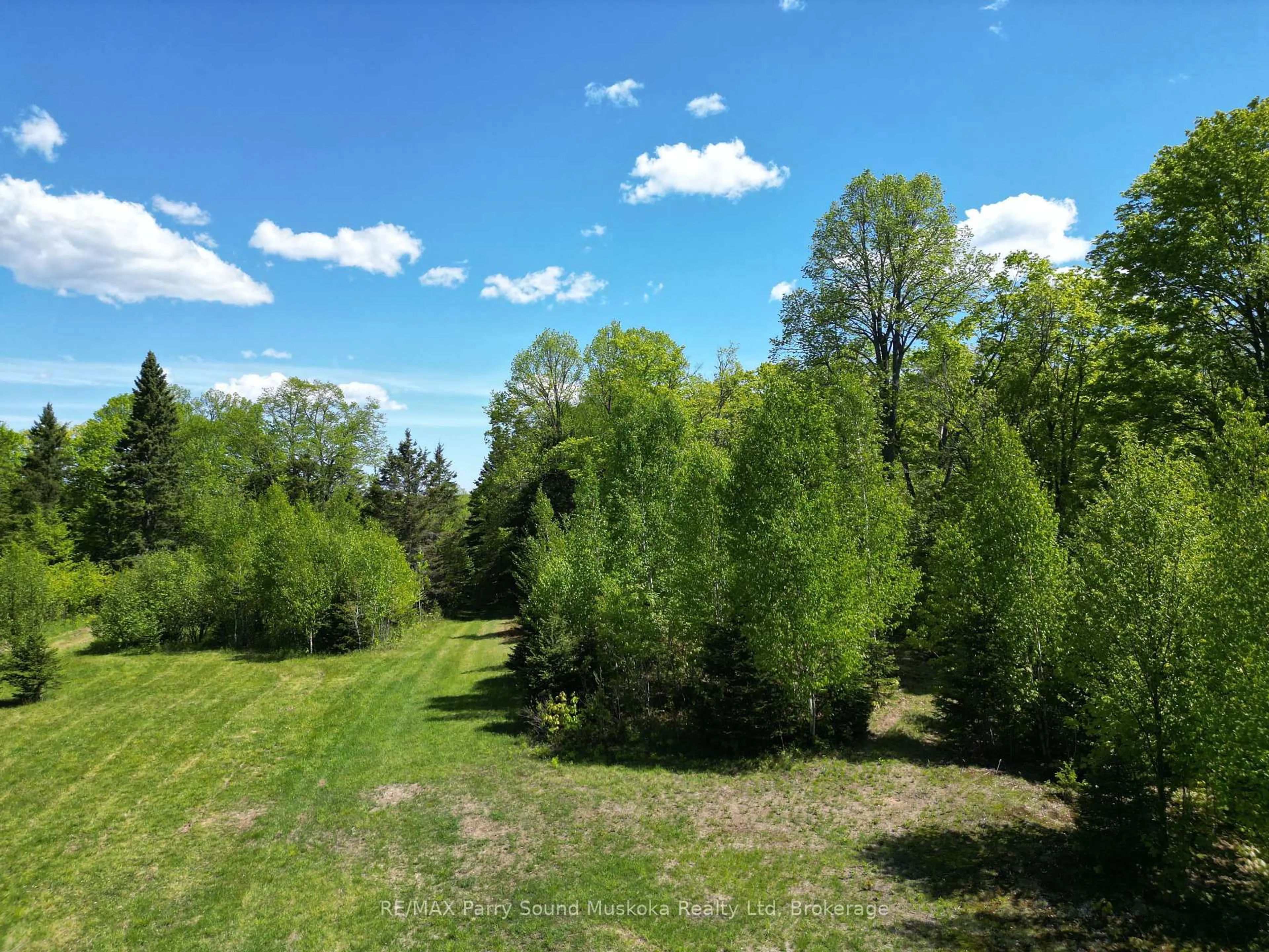 A pic from outside/outdoor area/front of a property/back of a property/a pic from drone, forest/trees view for 791 Clear Lake Rd, Parry Sound Remote Area Ontario P0H 1A0