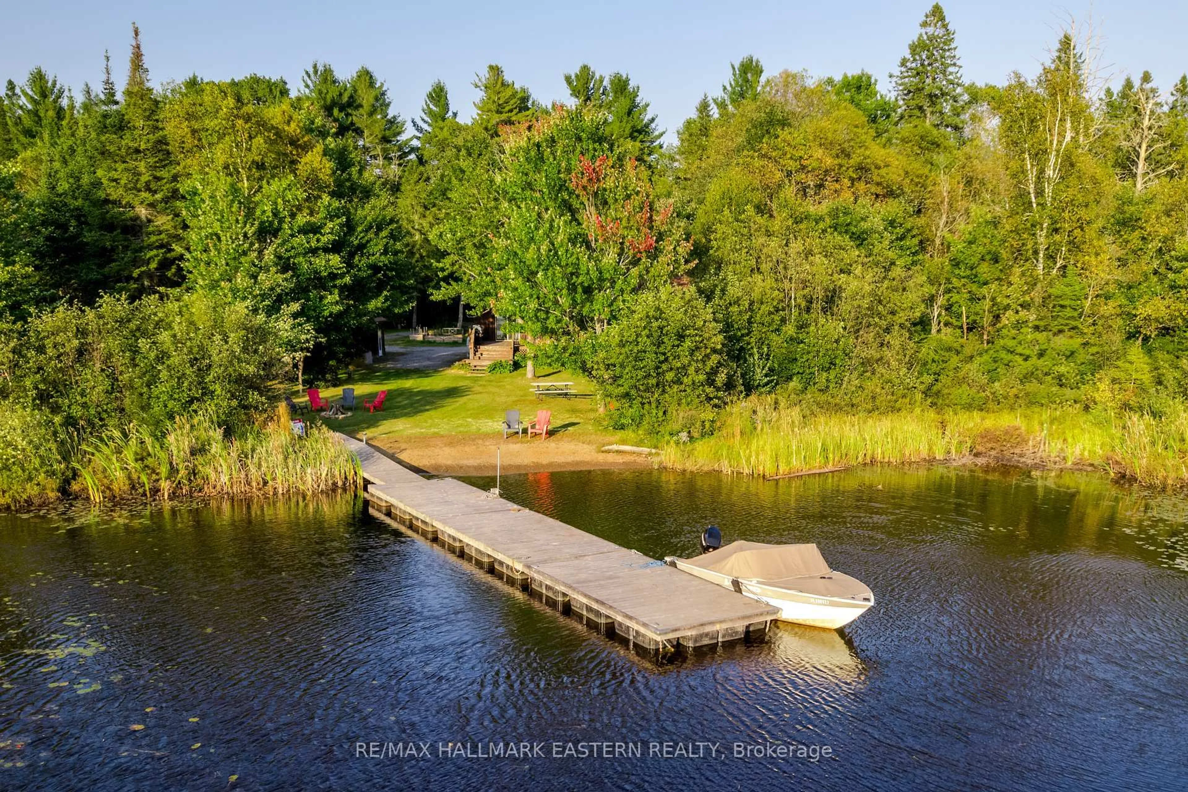 A pic from outside/outdoor area/front of a property/back of a property/a pic from drone, water/lake/river/ocean view for 152A Paradise Landing Rd, Maynooth Ontario K0L 2S0
