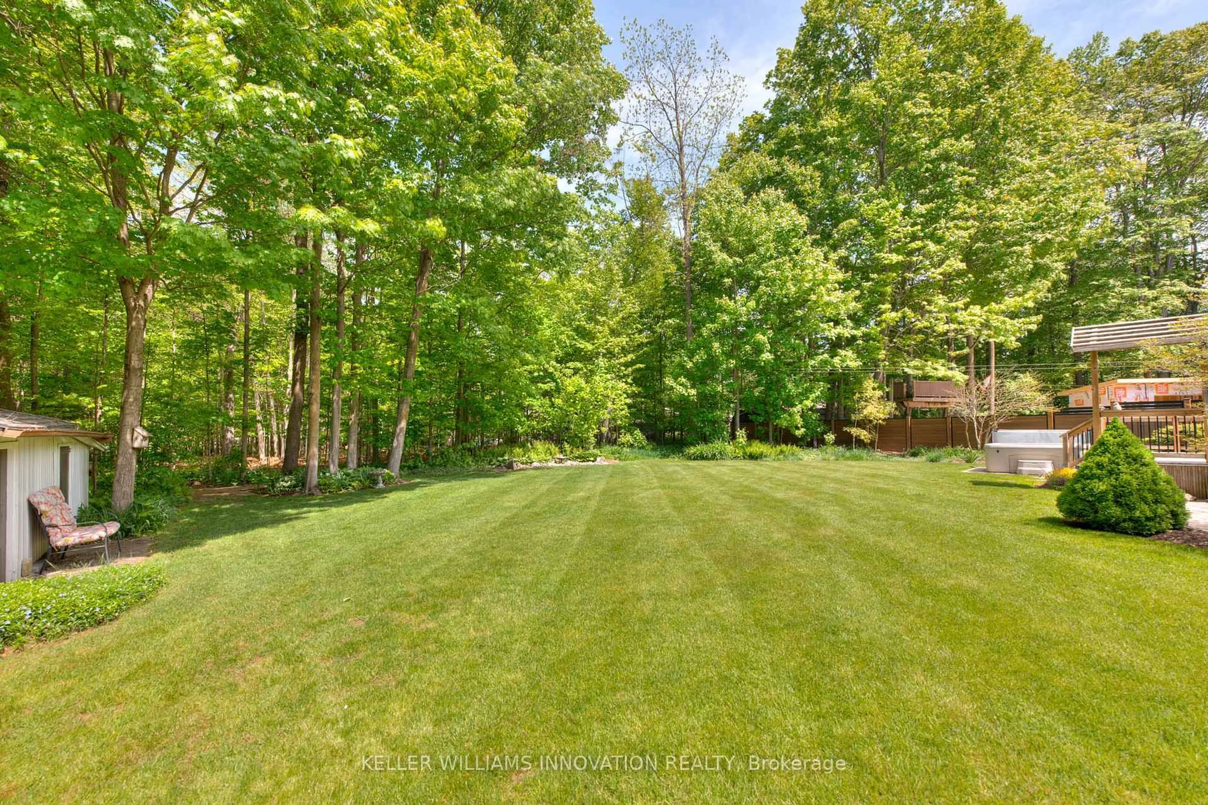 A pic from outside/outdoor area/front of a property/back of a property/a pic from drone, forest/trees view for 19 Sandpiper Crt, Woolwich Ontario N3B 3C5