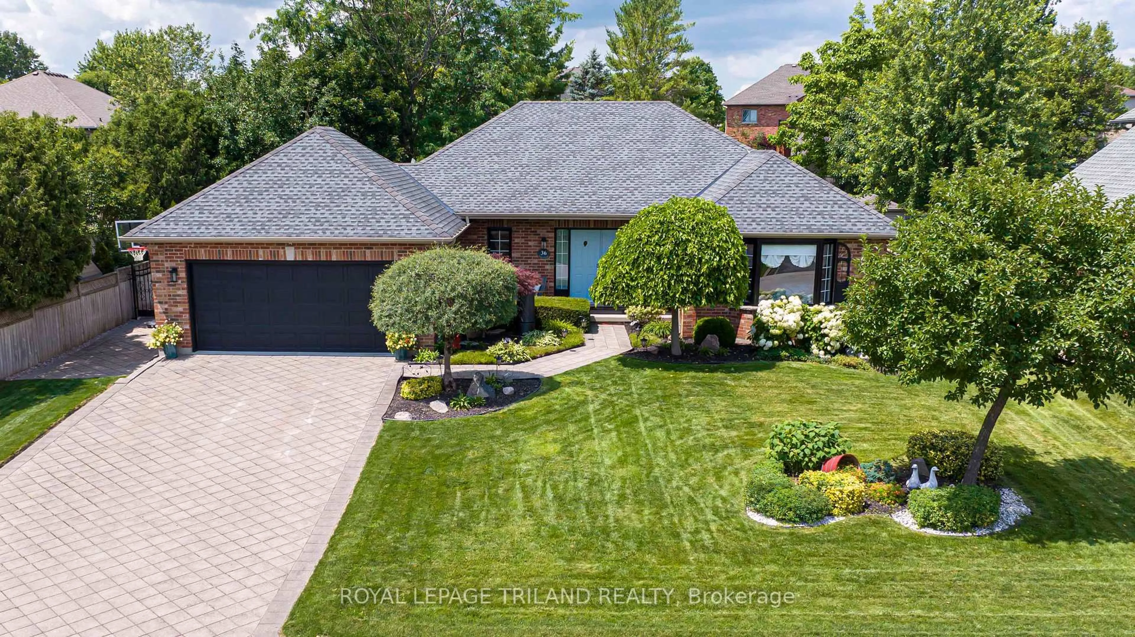 A pic from outside/outdoor area/front of a property/back of a property/a pic from drone, street for 36 WINGREEN Lane, Middlesex Centre Ontario N0L 1R0