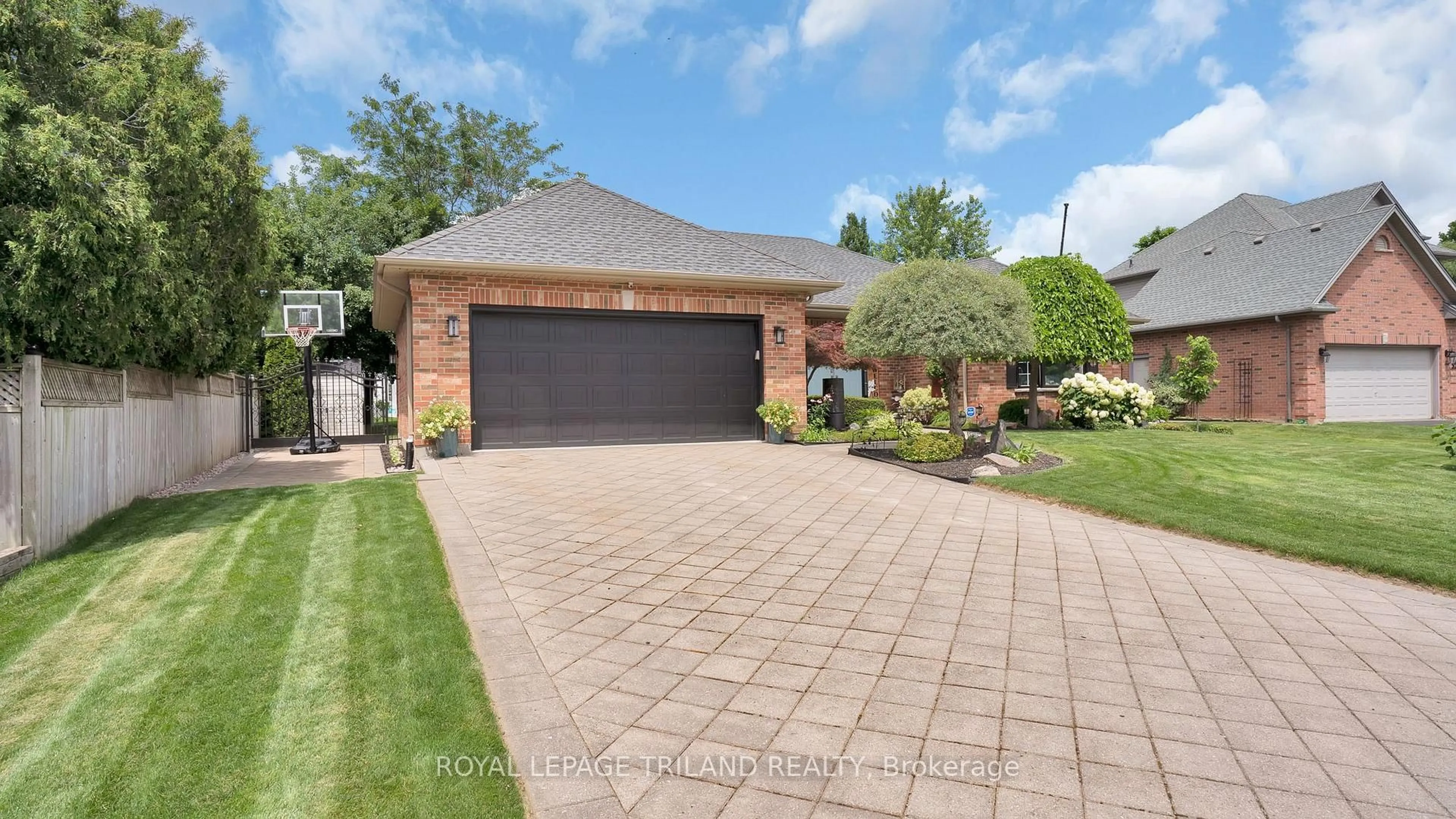 Home with brick exterior material, street for 36 WINGREEN Lane, Middlesex Centre Ontario N0L 1R0