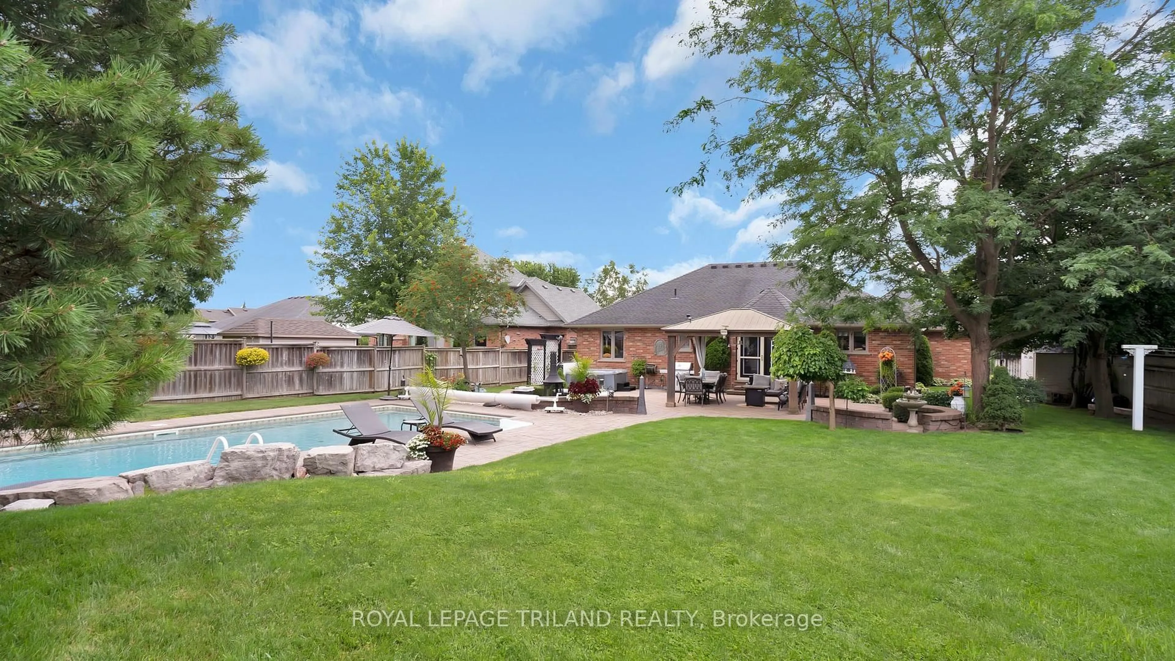 A pic from outside/outdoor area/front of a property/back of a property/a pic from drone, water/lake/river/ocean view for 36 WINGREEN Lane, Middlesex Centre Ontario N0L 1R0