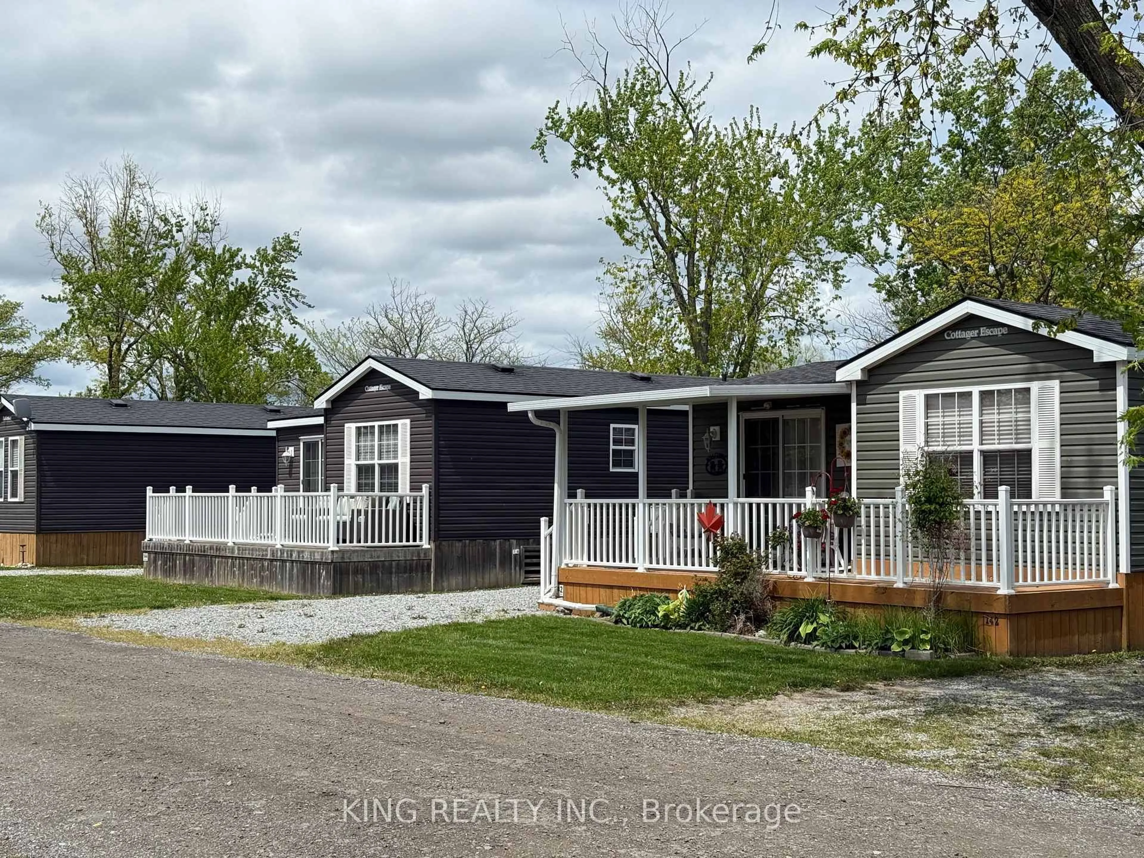 Home with vinyl exterior material, street for 1501 Line 8 Rd #141, Niagara-on-the-Lake Ontario L0S 1L0