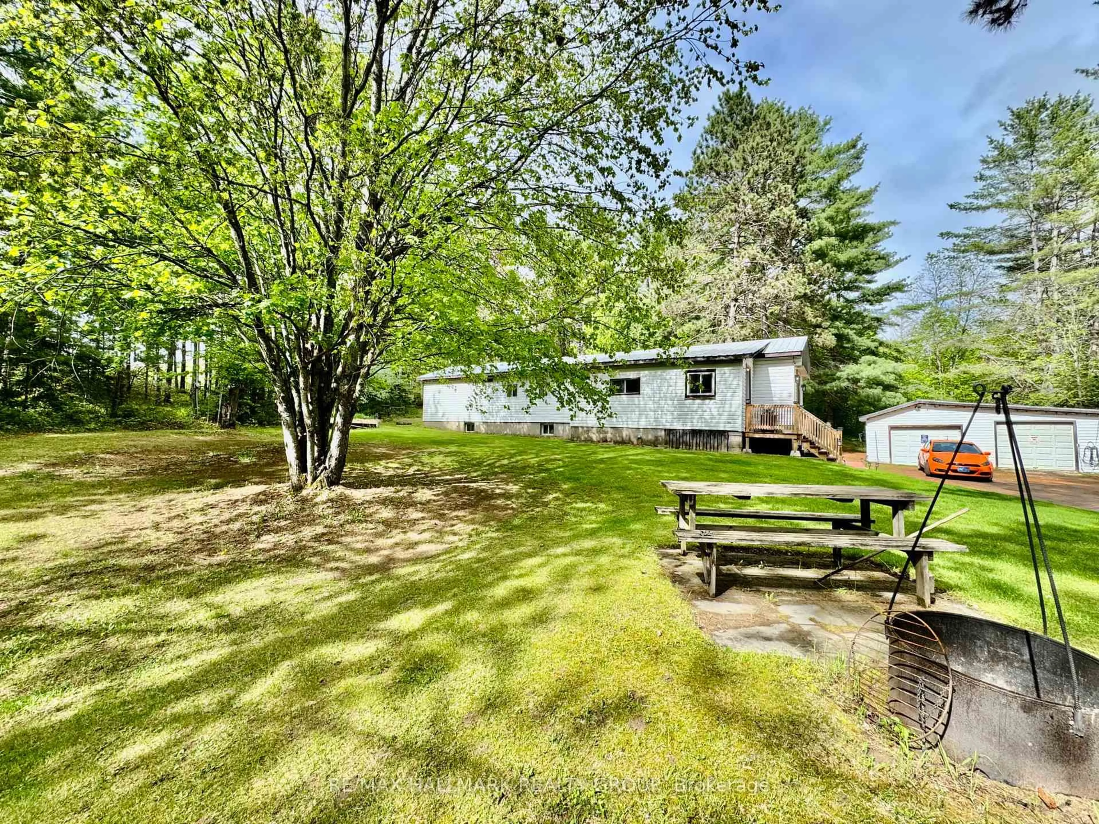 A pic from outside/outdoor area/front of a property/back of a property/a pic from drone, water/lake/river/ocean view for 1039 Long Lake Rd, Pembroke Ontario K8A 6W8