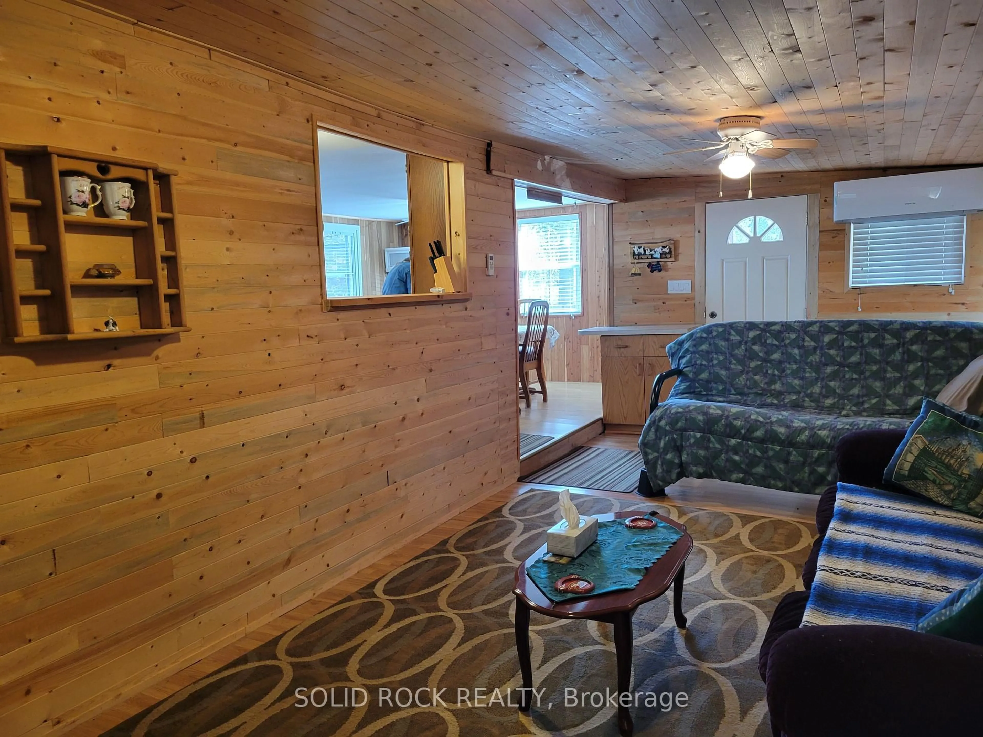 Living room with furniture, wood/laminate floor for 137 Trillium Tr, Trent Hills Ontario K0L 1L0