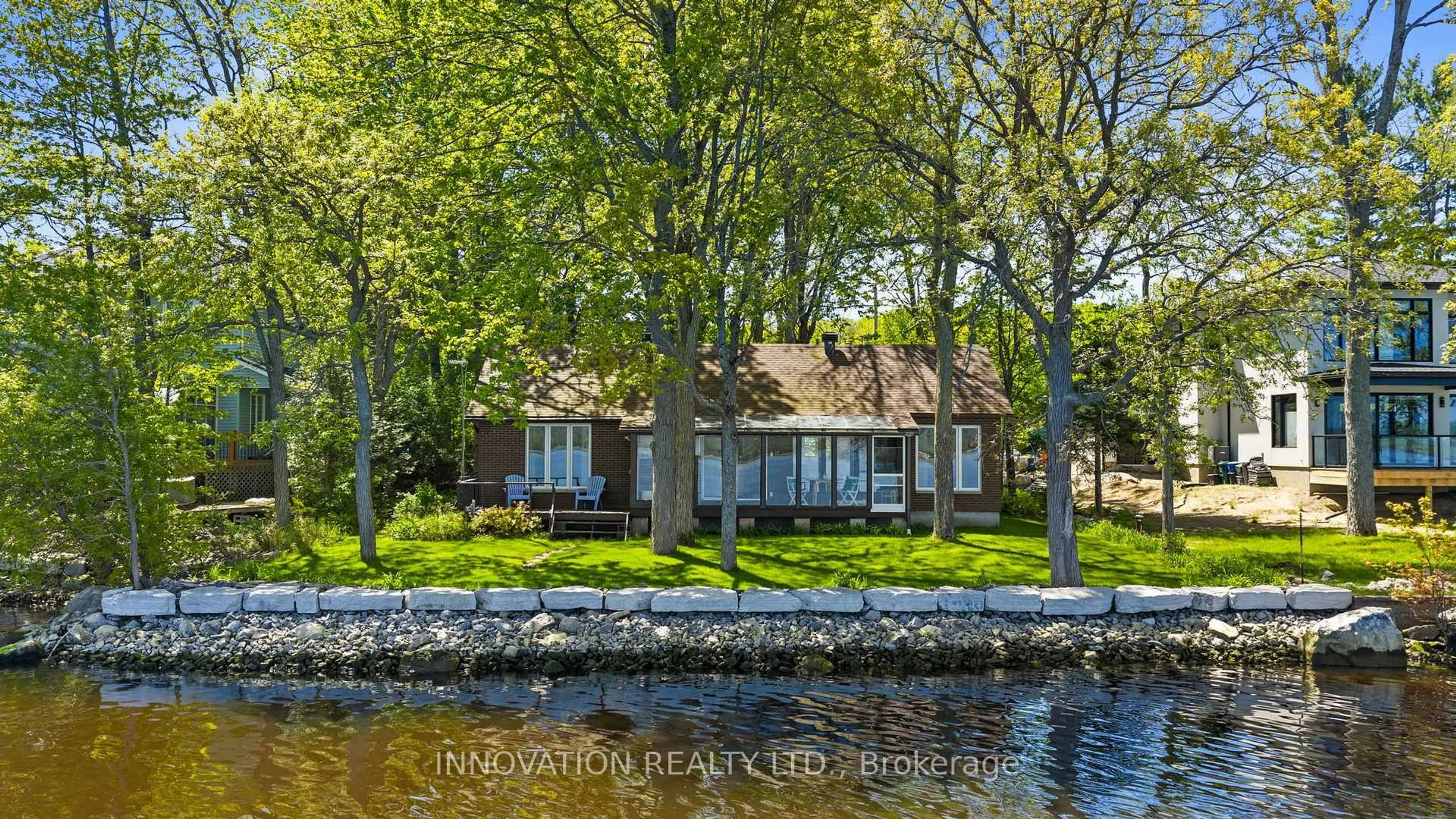 A pic from outside/outdoor area/front of a property/back of a property/a pic from drone, water/lake/river/ocean view for 852 Bayview Dr, Ottawa Ontario K0A 3M0