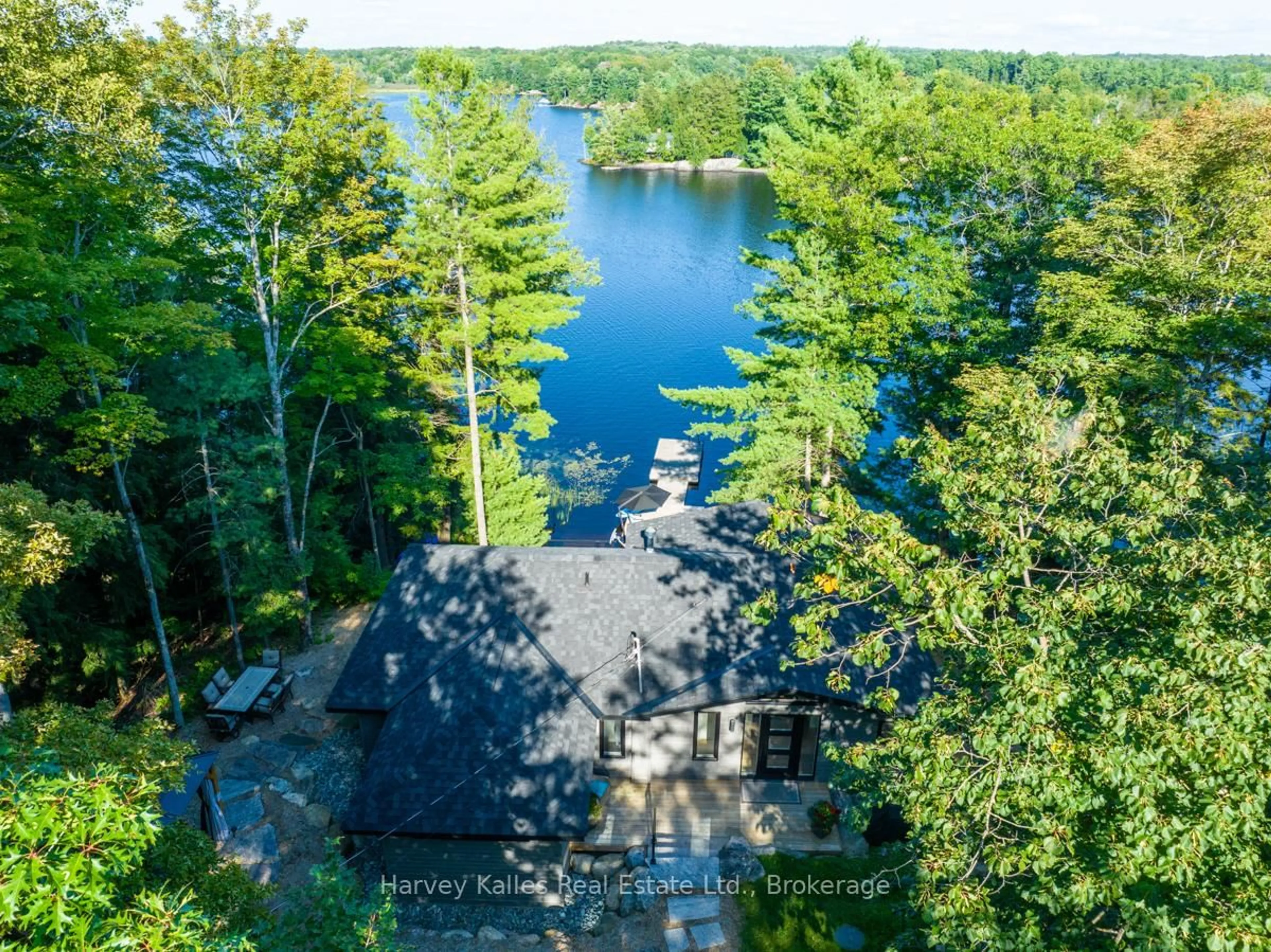 A pic from outside/outdoor area/front of a property/back of a property/a pic from drone, water/lake/river/ocean view for 1035 Brandy Crest Rd ##16, Muskoka Lakes Ontario P0B 1J0