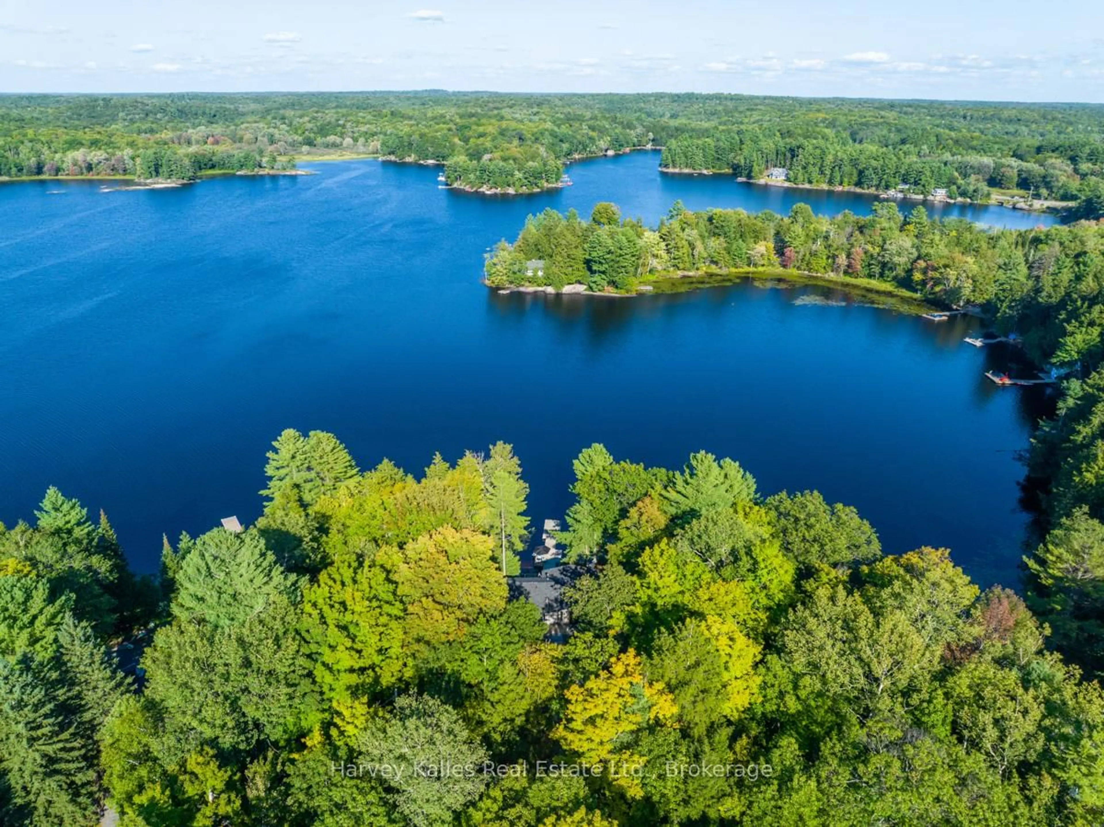 A pic from outside/outdoor area/front of a property/back of a property/a pic from drone, water/lake/river/ocean view for 1035 Brandy Crest Rd ##16, Muskoka Lakes Ontario P0B 1J0